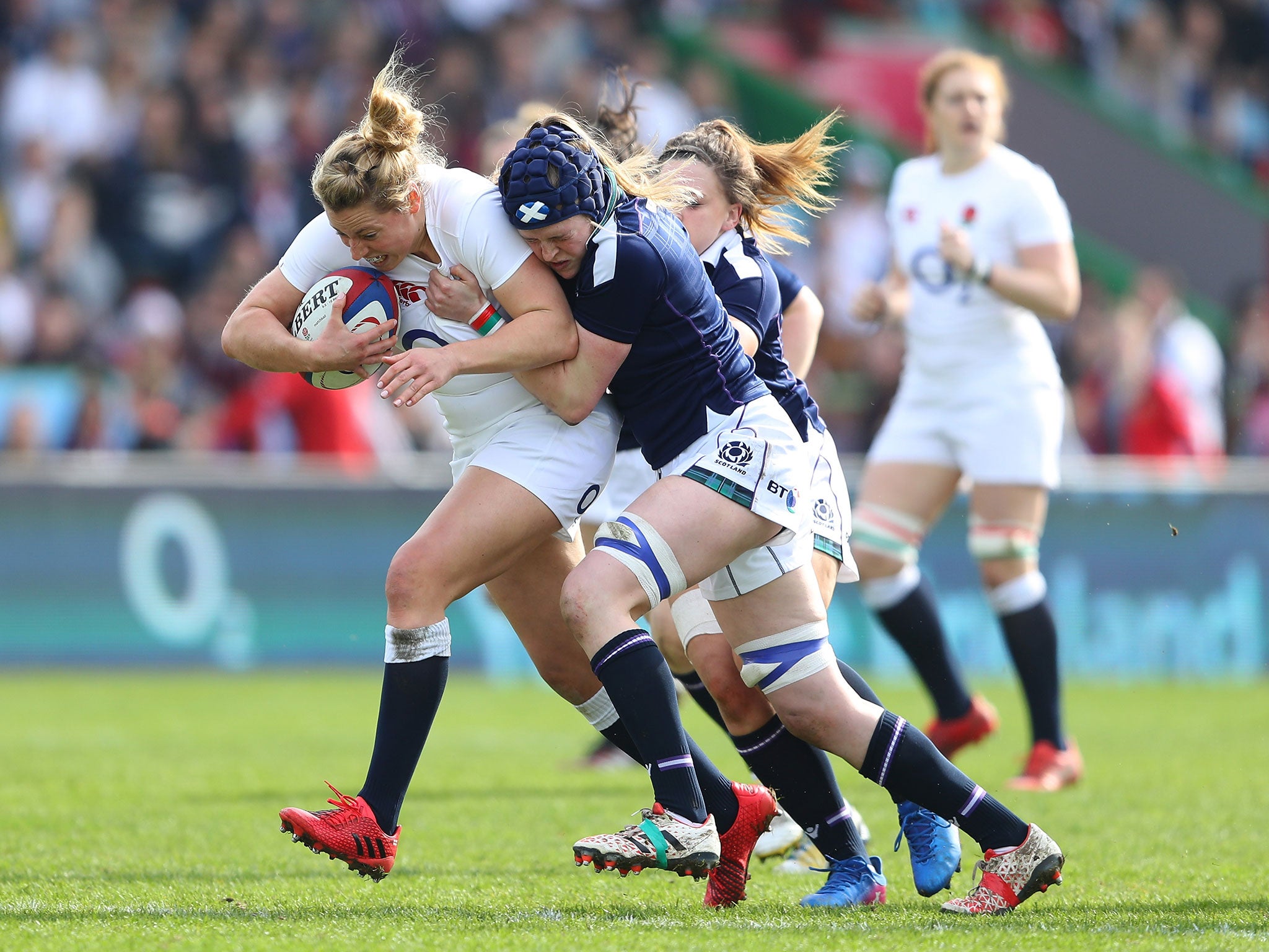 Amber Reed attempts to break free of a Scottish tackle