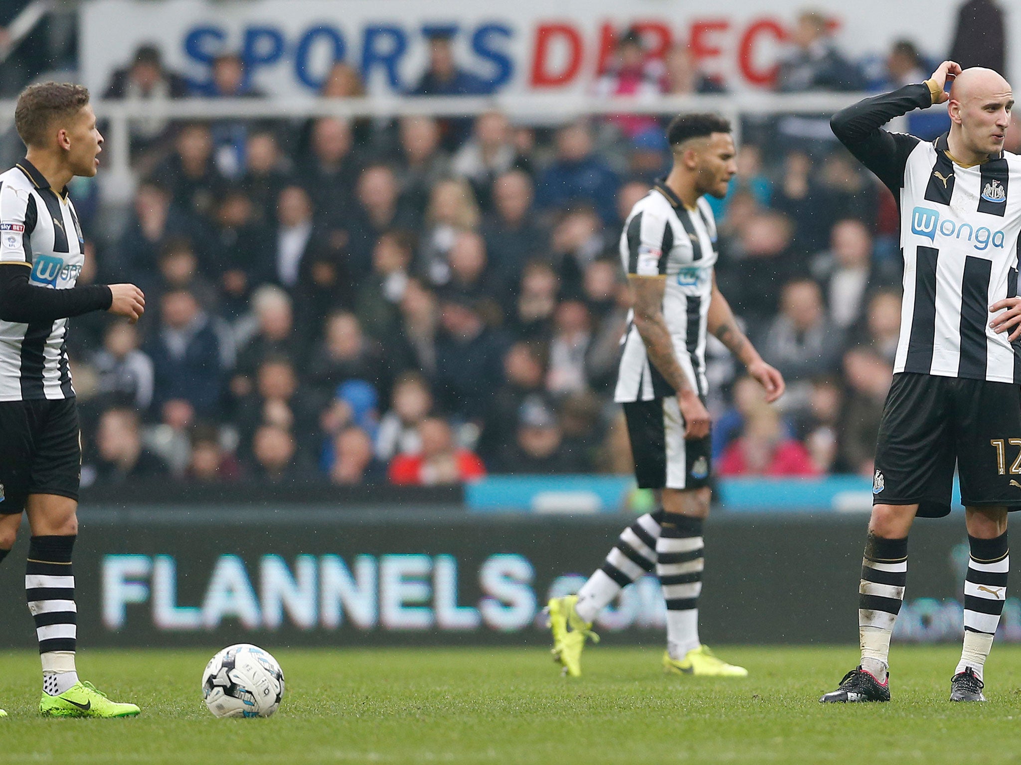 &#13;
Newcastle's players react after conceding a third goal (PA)&#13;