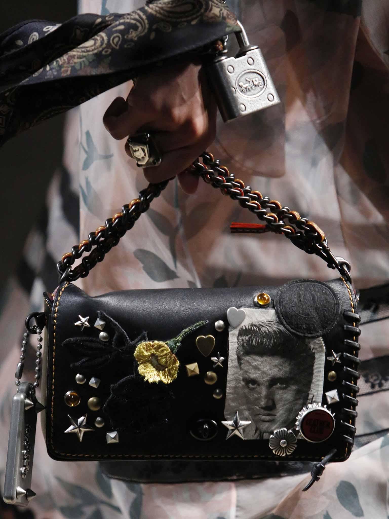 At Coach, the Dinky bag came loaded with Elvis images, fringing and tooled metal hardware