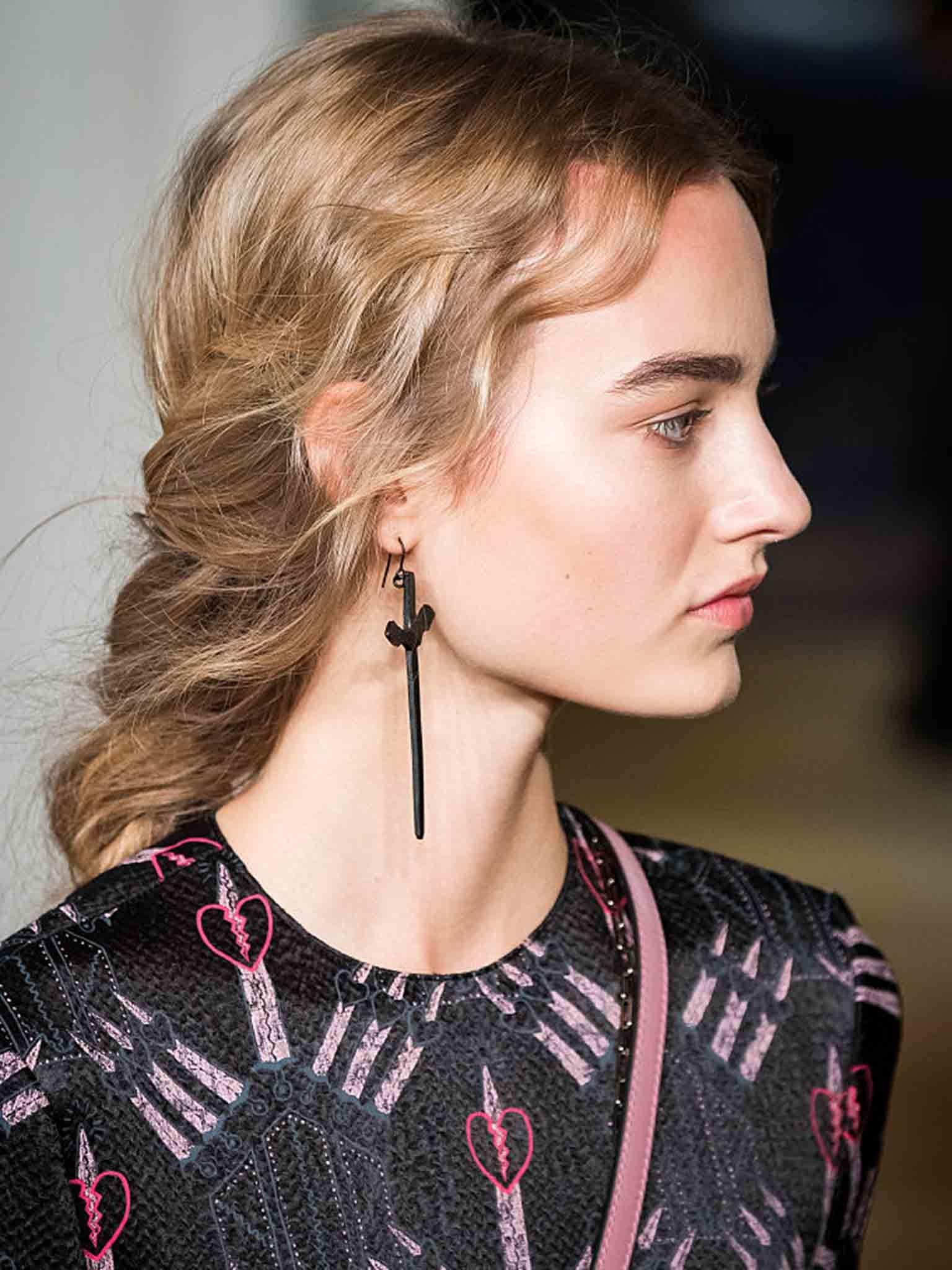 At Valentino, Rapunzel braids hung loosely down each model’s back (Getty)