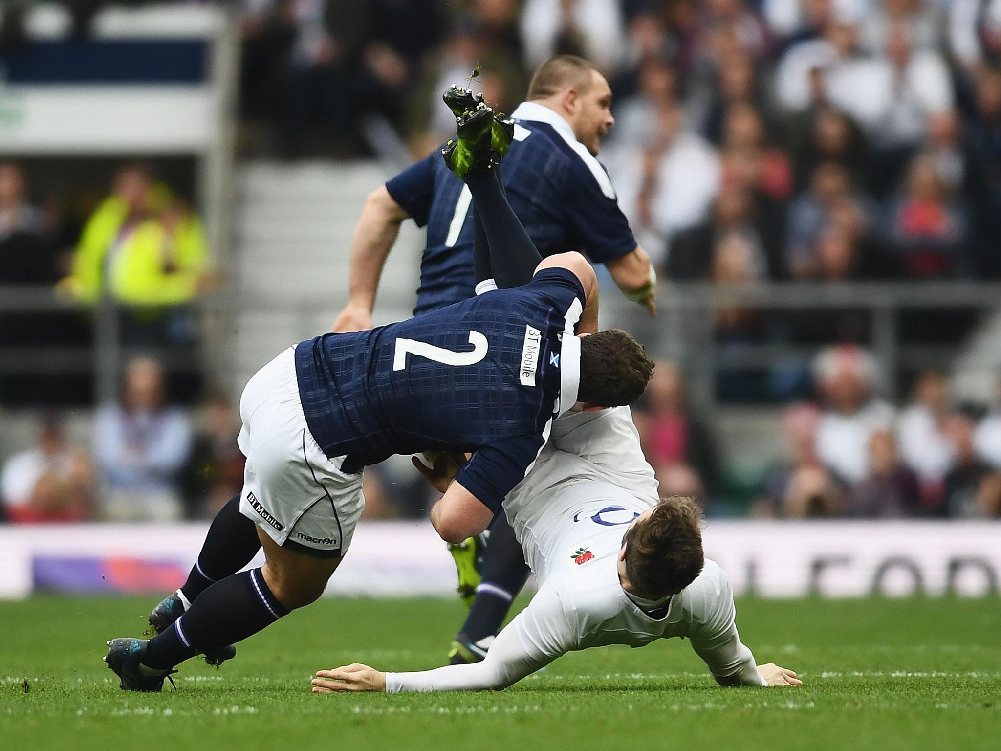 Elliot Daly suffered a suspected concussion after a dump tackle by Scotland's Fraser Brown