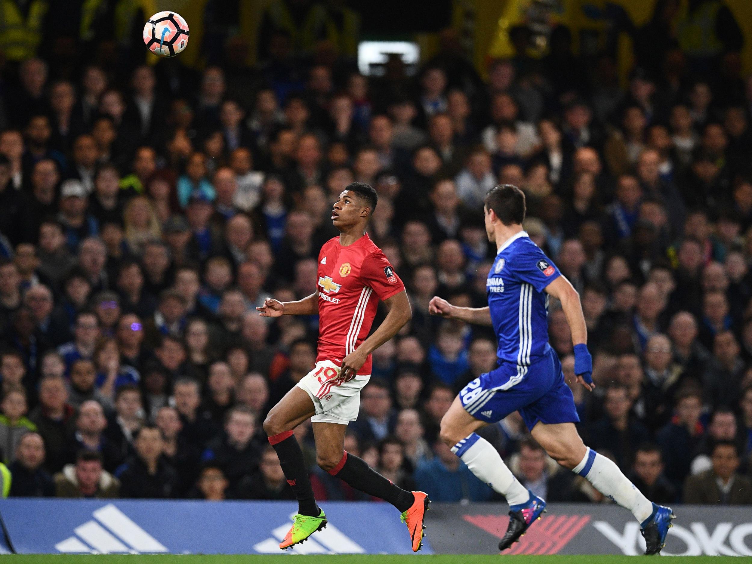 &#13;
Rashford looks to bring the ball under control &#13;