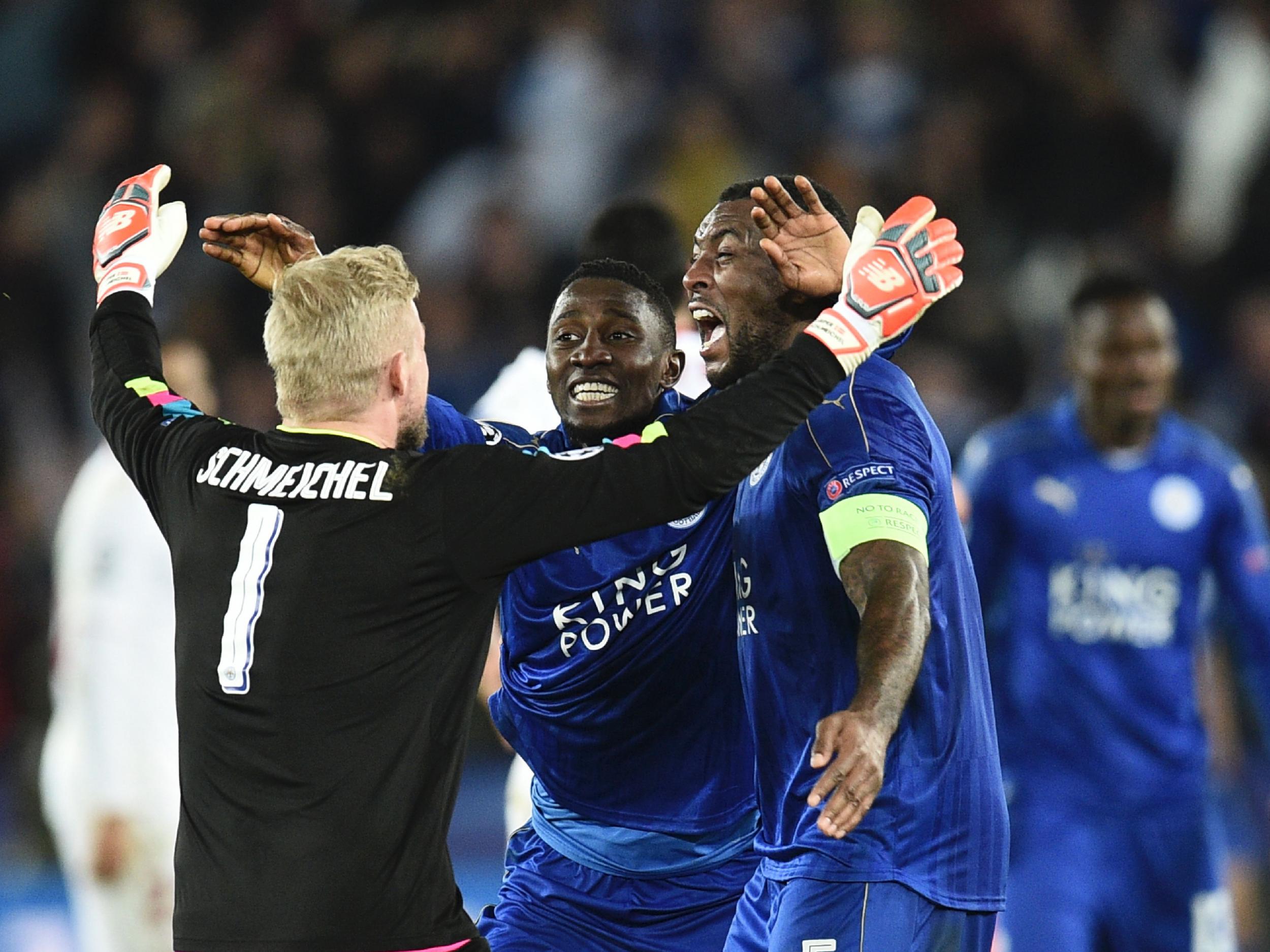 Leicester's players celebrate at the final whistle