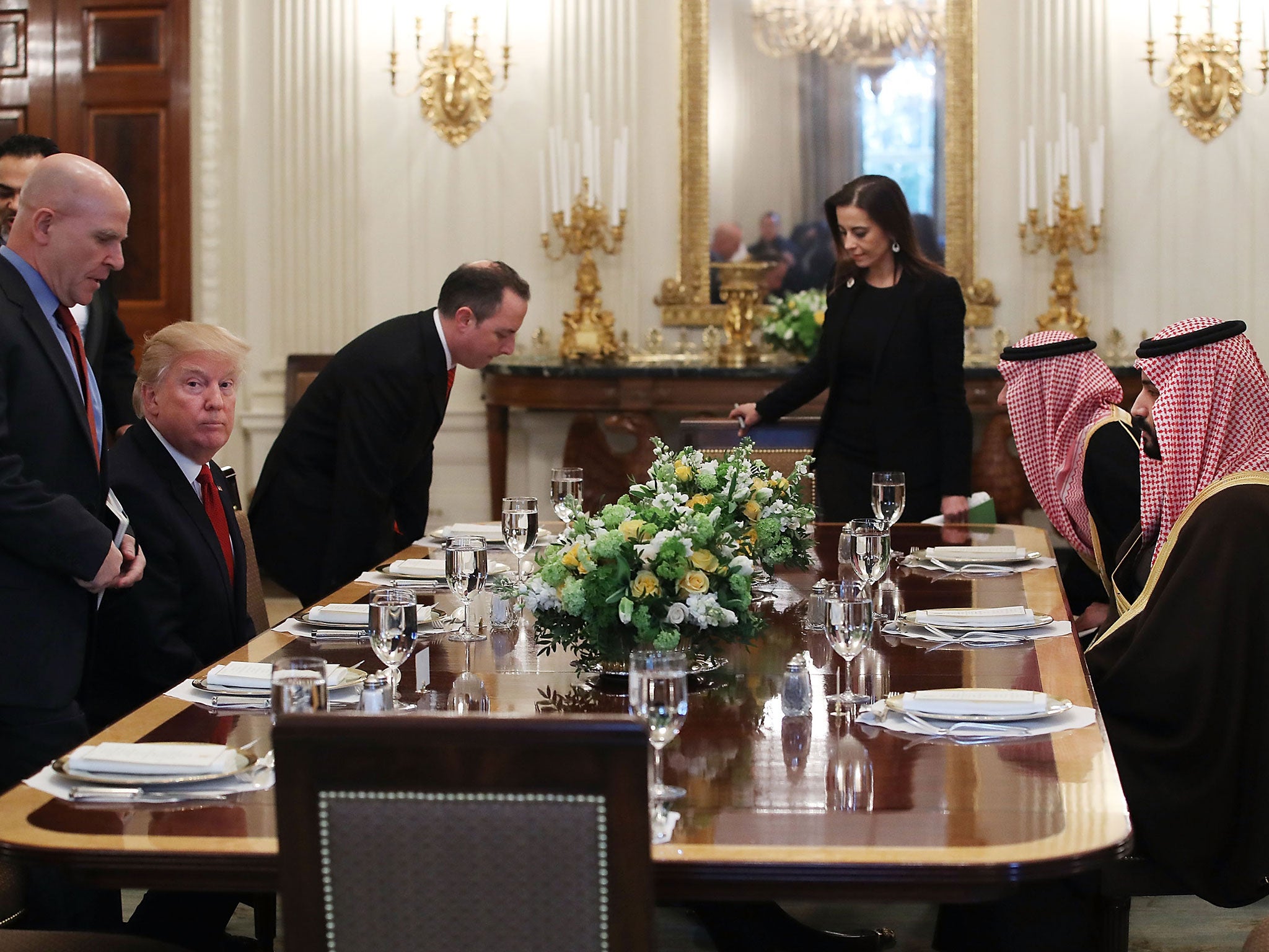 Donald Trump and Deputy Crown Prince Mohammed bin Salman prepare to have lunch in the State Dining Room at the White House on 14 March