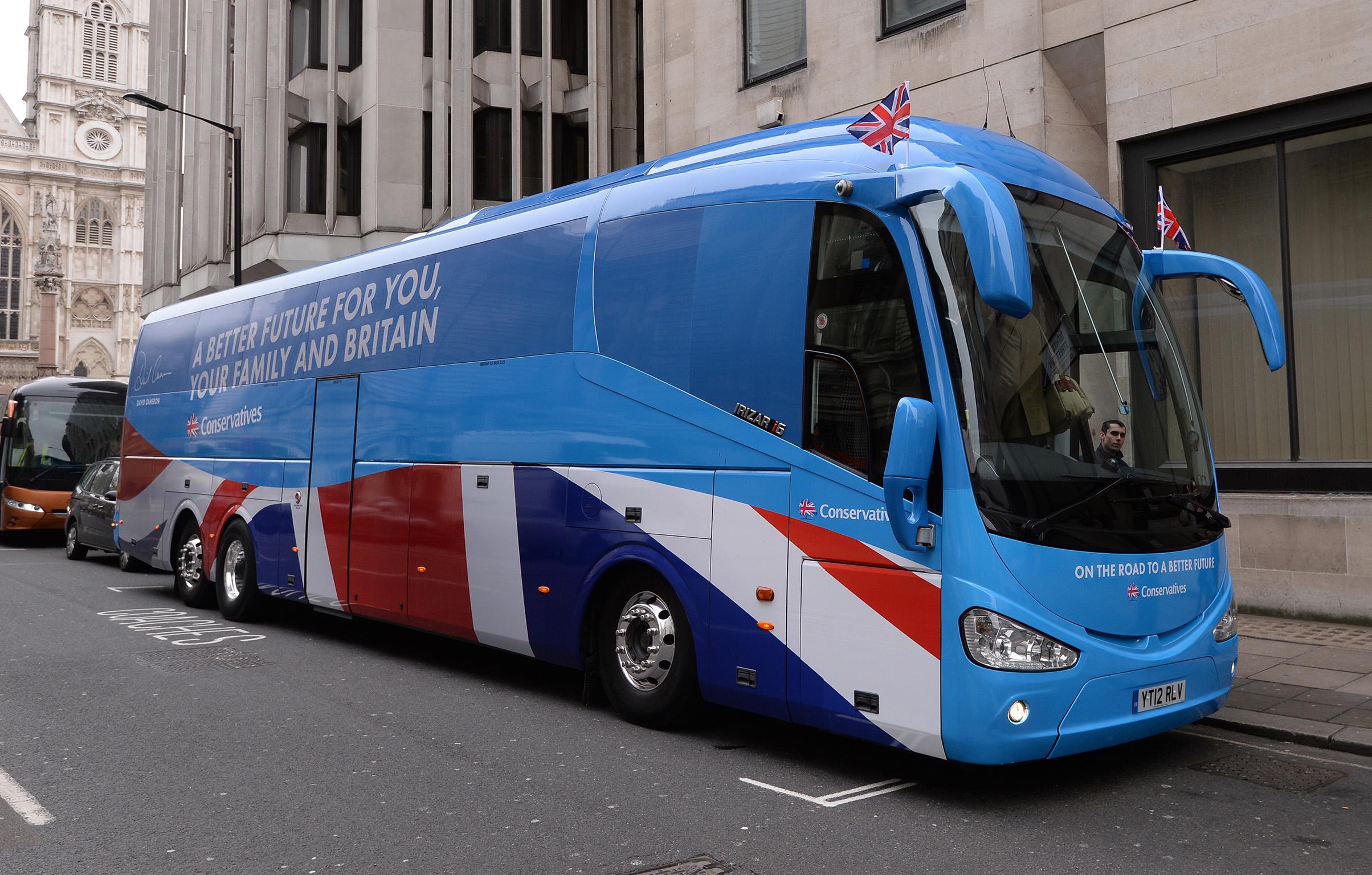 Tory candidates have been accused of breaking strict spending limits with their battle bus scheme