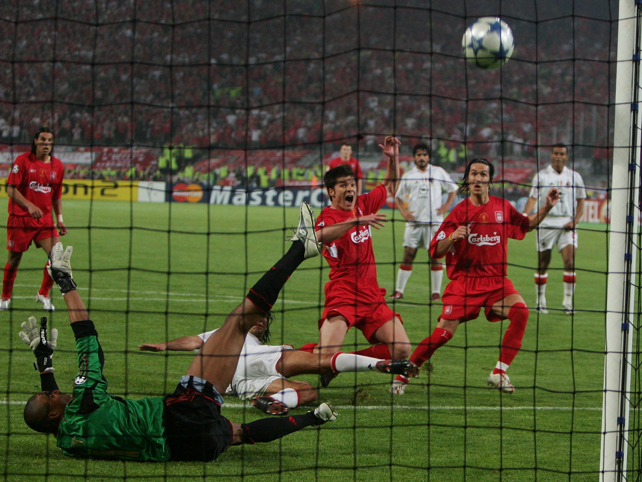 Alonso scored the rebound after Dida saved his initial penalty