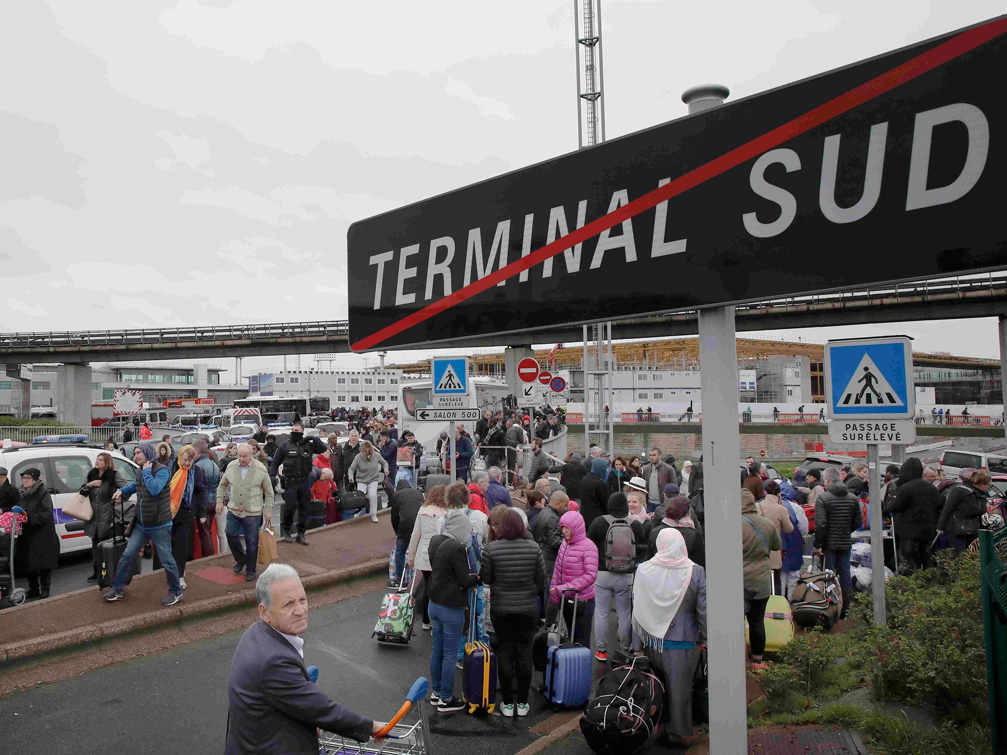 Passengers evacuated from Orly airport’s southern terminal after the shooting