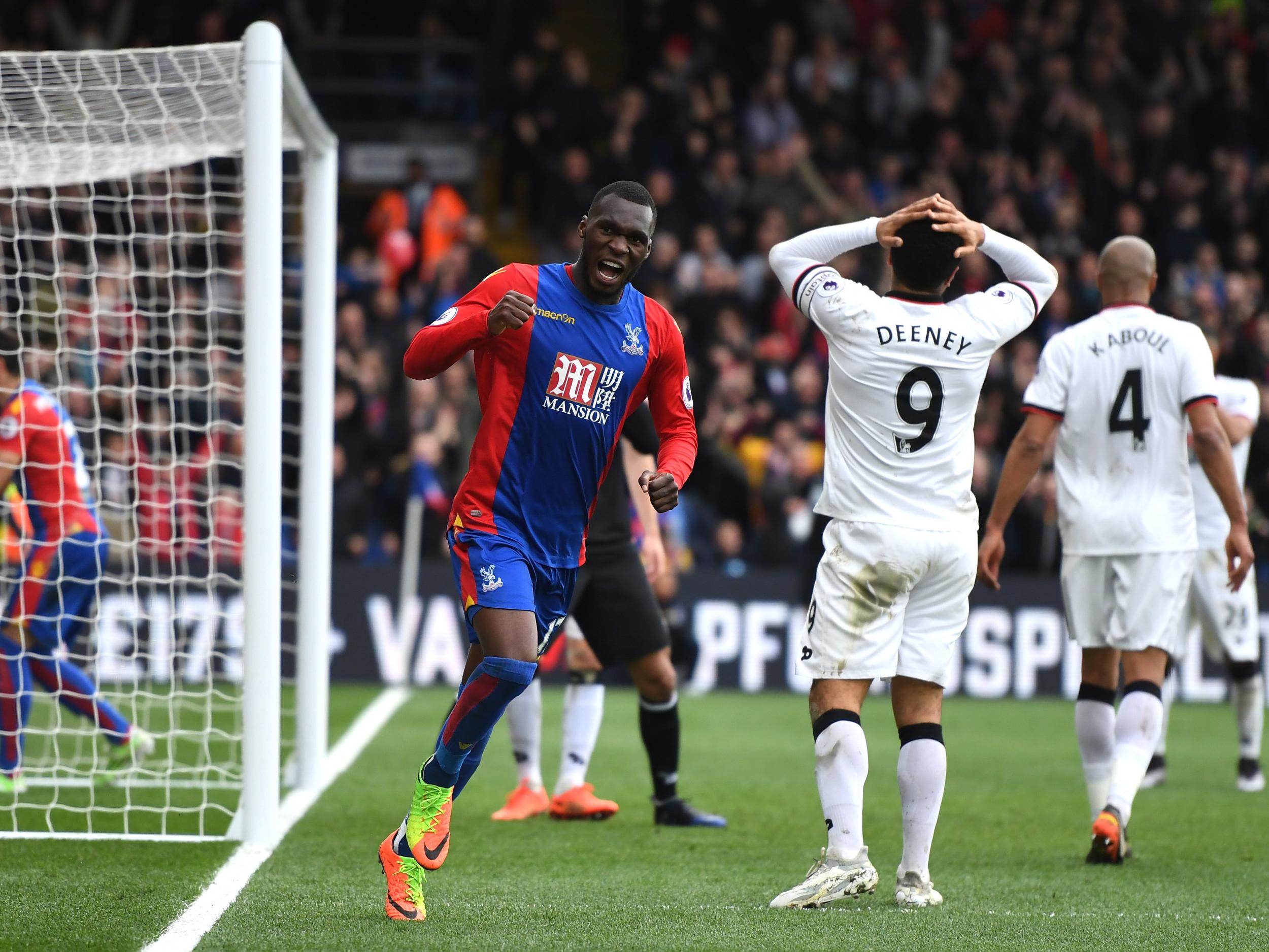 Benteke wheels away in celebration after Deeney's decisive own-goal