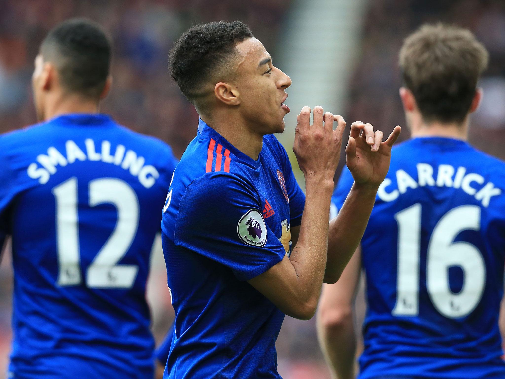 Jesse Lingard celebrates scoring
