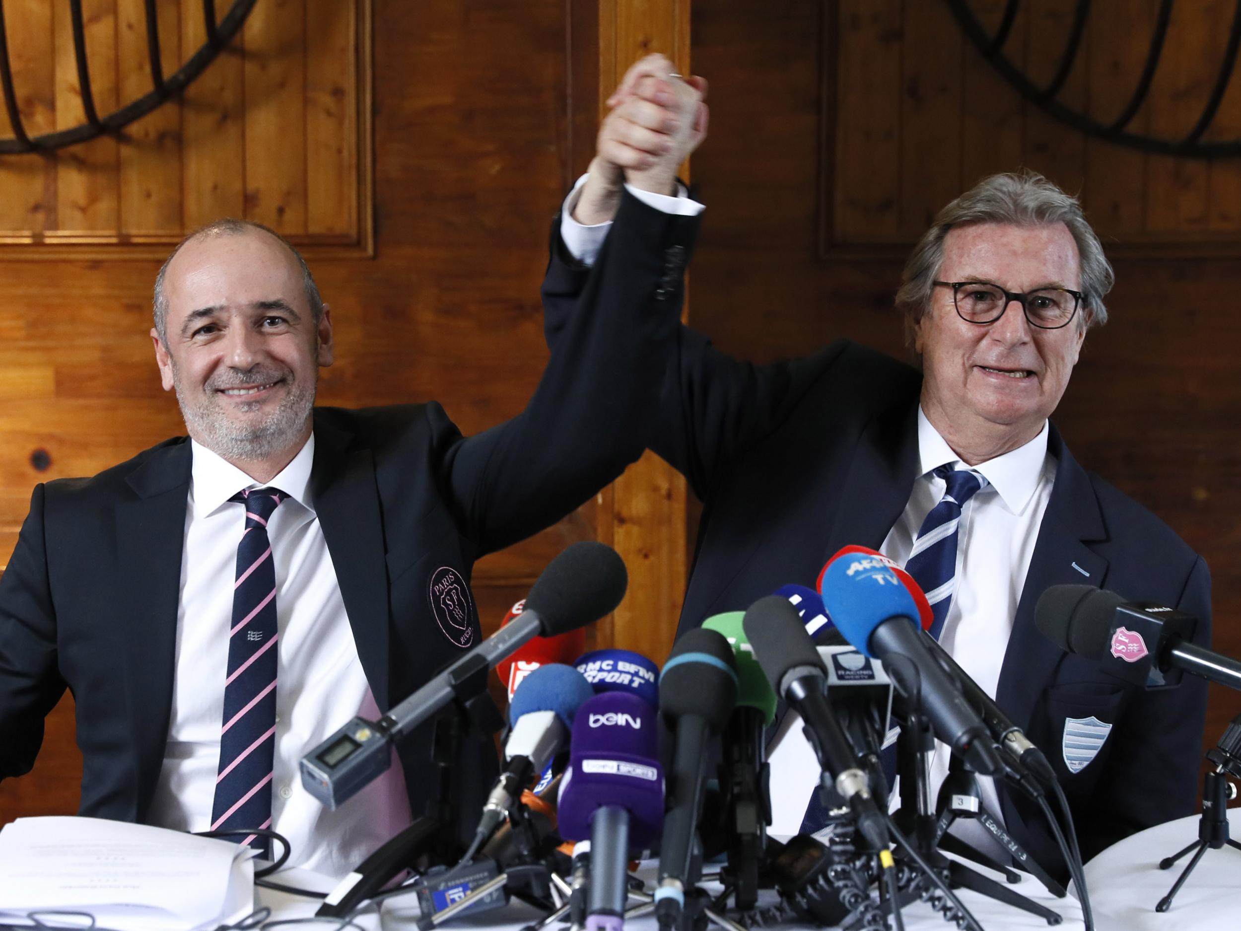 Racing 92 president Jacky Lorenzetti (R) and Stade Francais president Thomas Savare