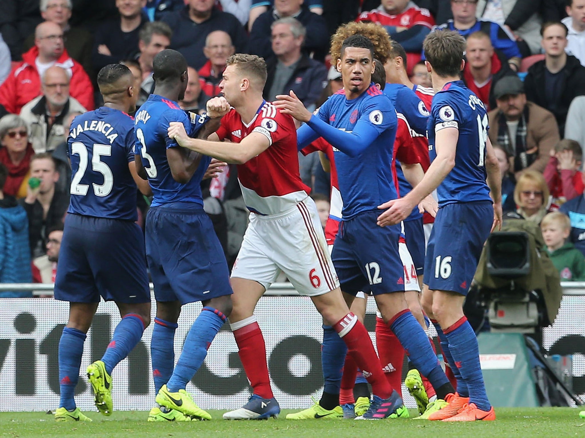 Players from both sides were involved in a fracas during the game's closing stages