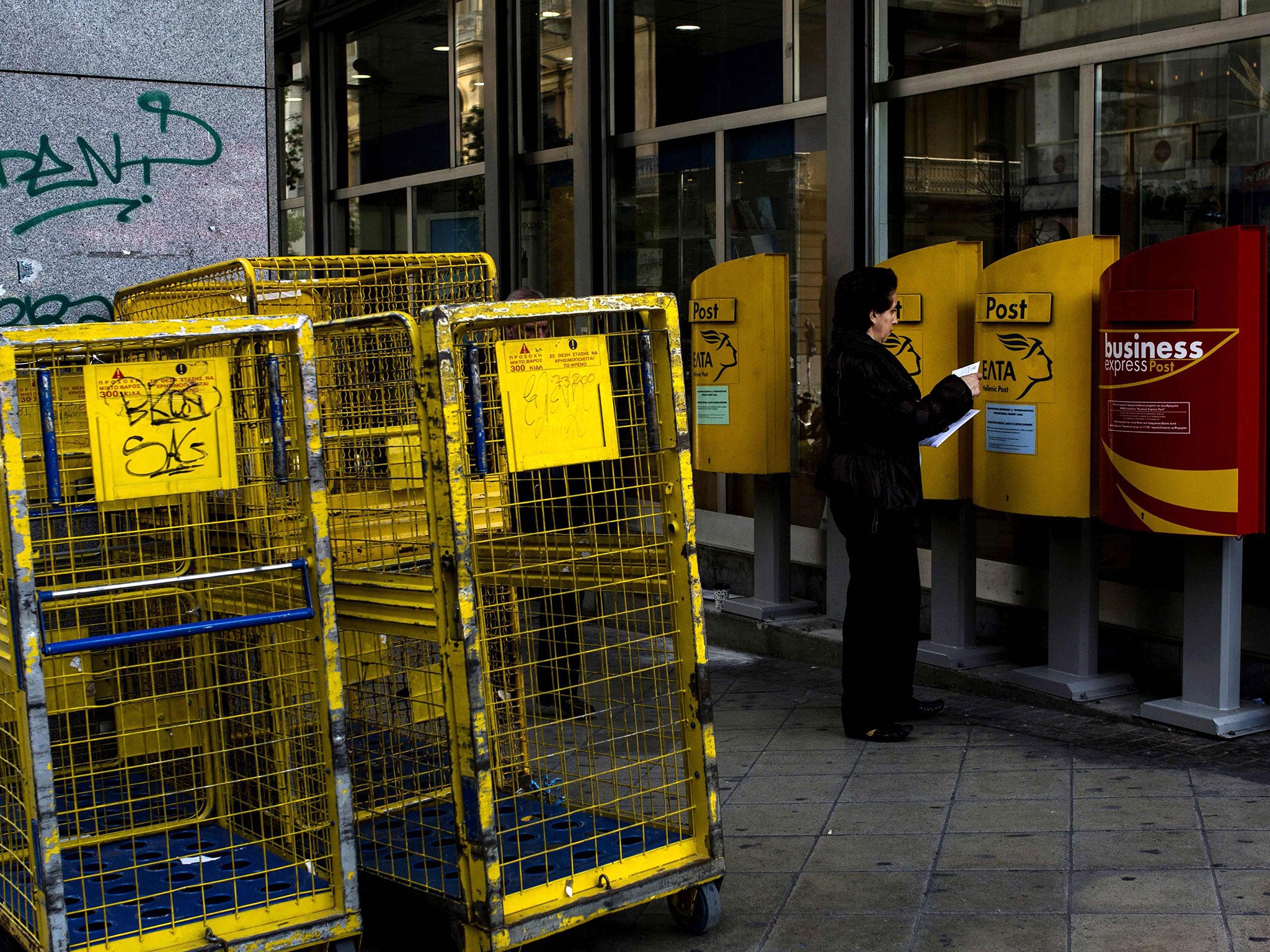 Security sweeps have been increased in the Greek postal service after it was used to send parcel bombs