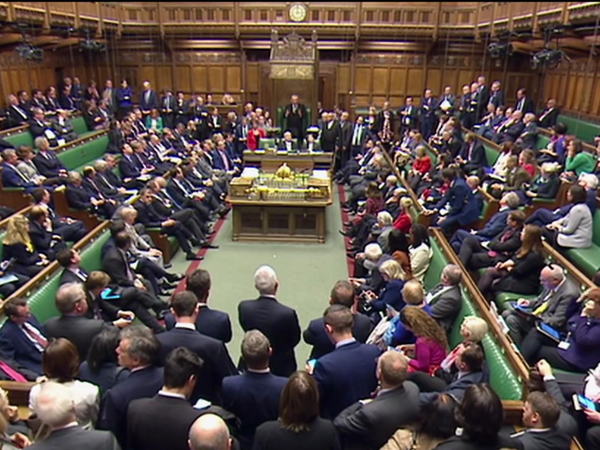 MPs wait in the House of Commons as information drifts through via their phones and the Deputy Speaker, David Lidington