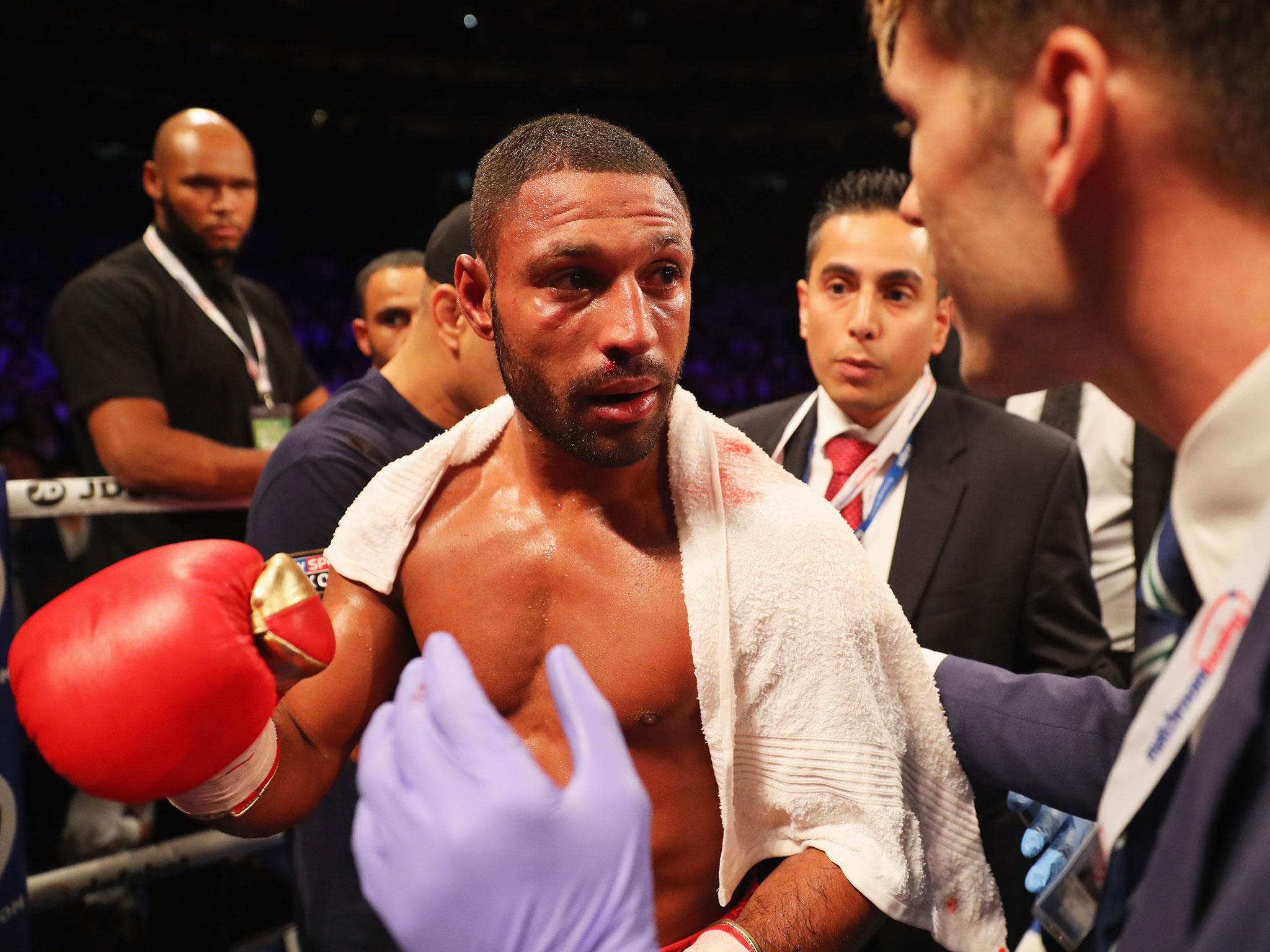 Kell Brook looks on in defeat to Gennady Golovkin after their World Middleweight Title contest at The O2 Arena