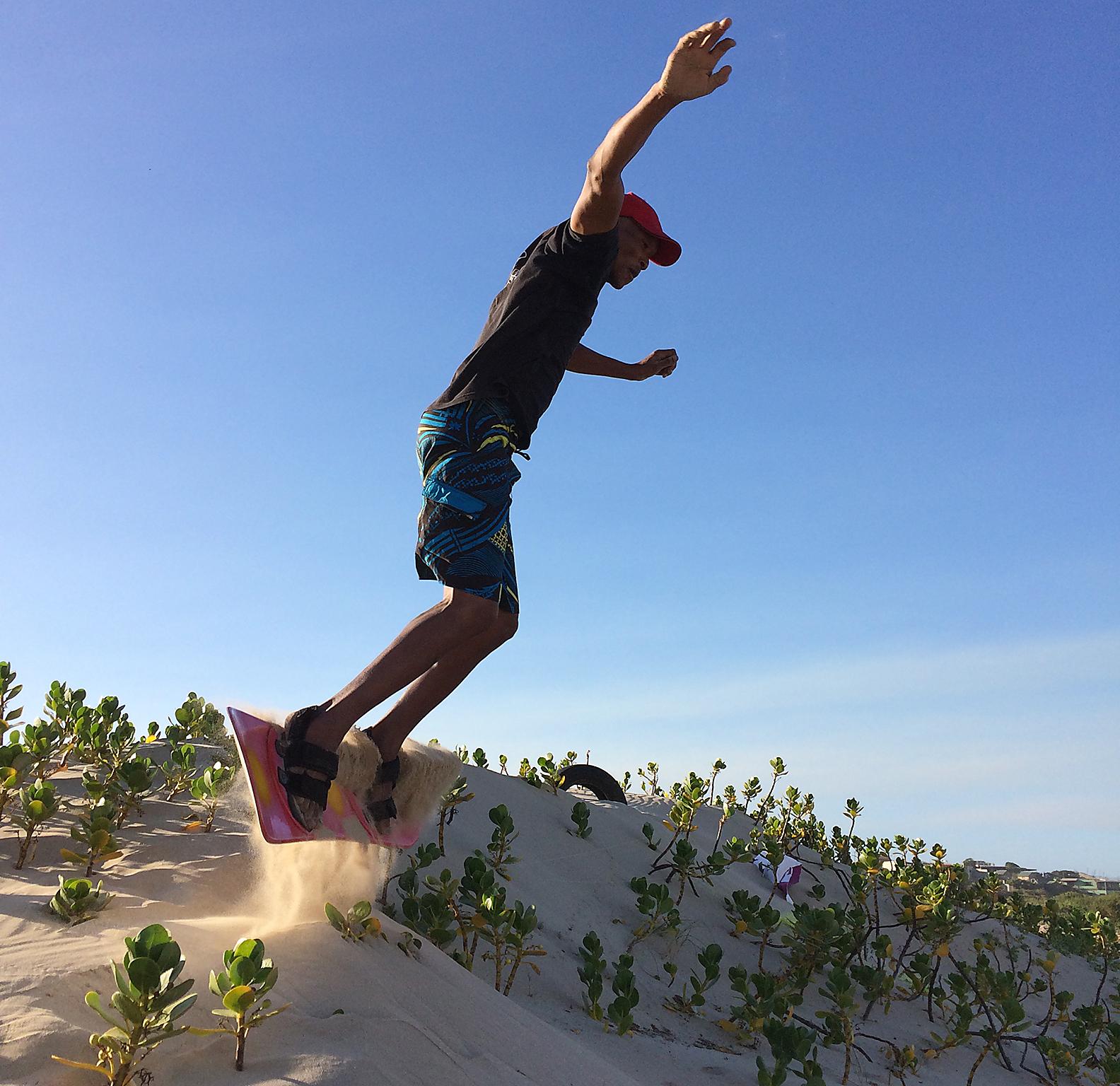 Jeffreys Bay, eastern Cape: Airs came screaming off the top of the dunes, carving across the slope, kicking up sand