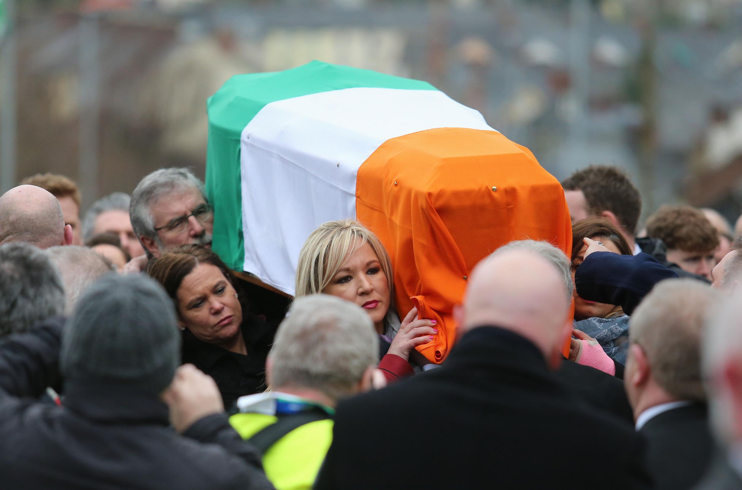 Sinn Fein’s Gerry Adams and Michelle O'Neill carrying Martin McGuinness's coffin PA