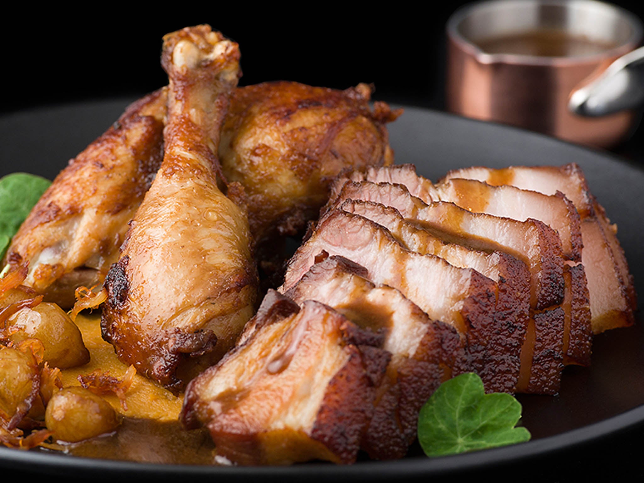 The pork and chicken adobo sharing plate serves the meat on sweet potato mash