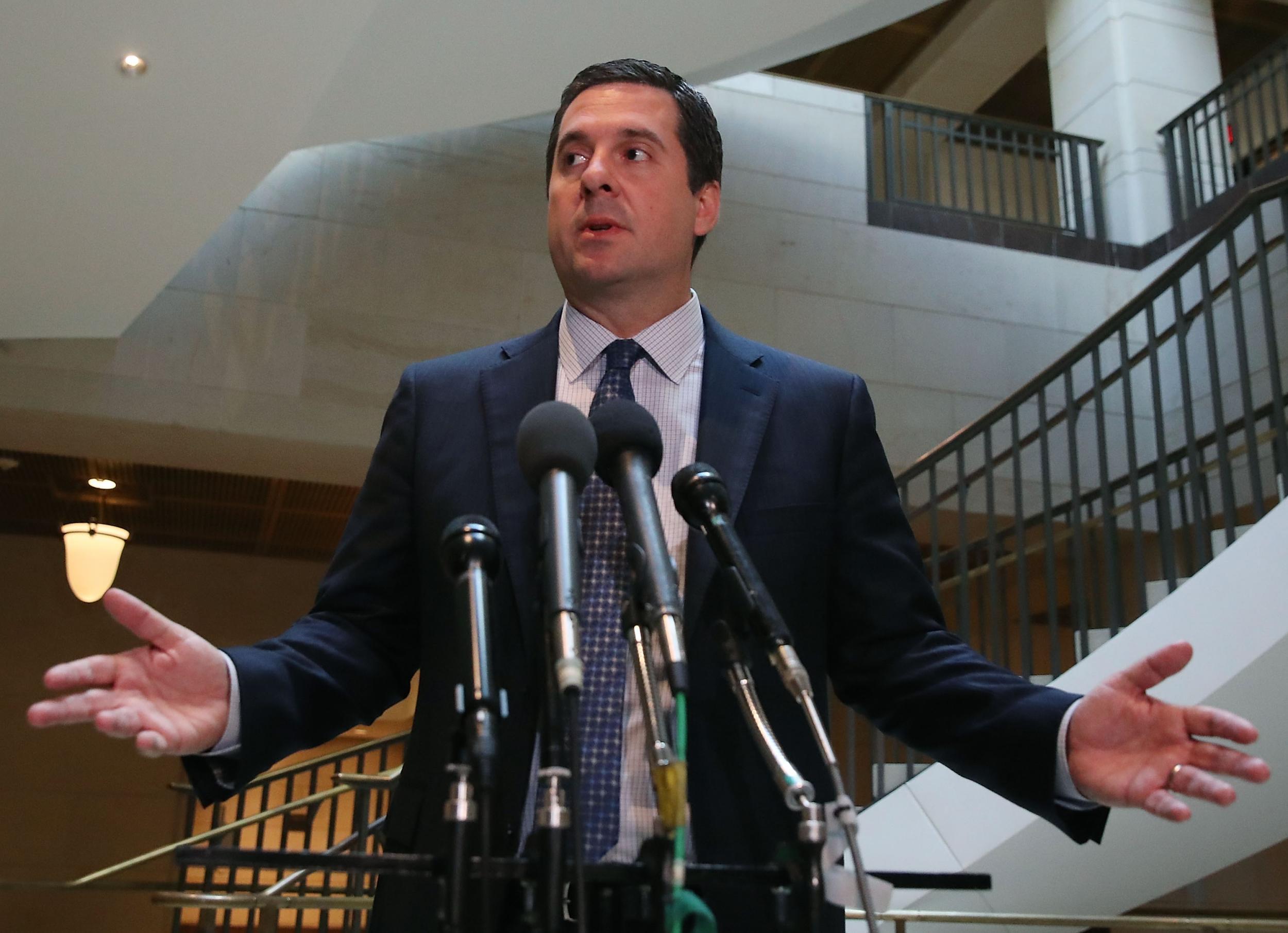 Devin Nunes talks to reporters after leaving a closed meeting with House Intelligence Committee