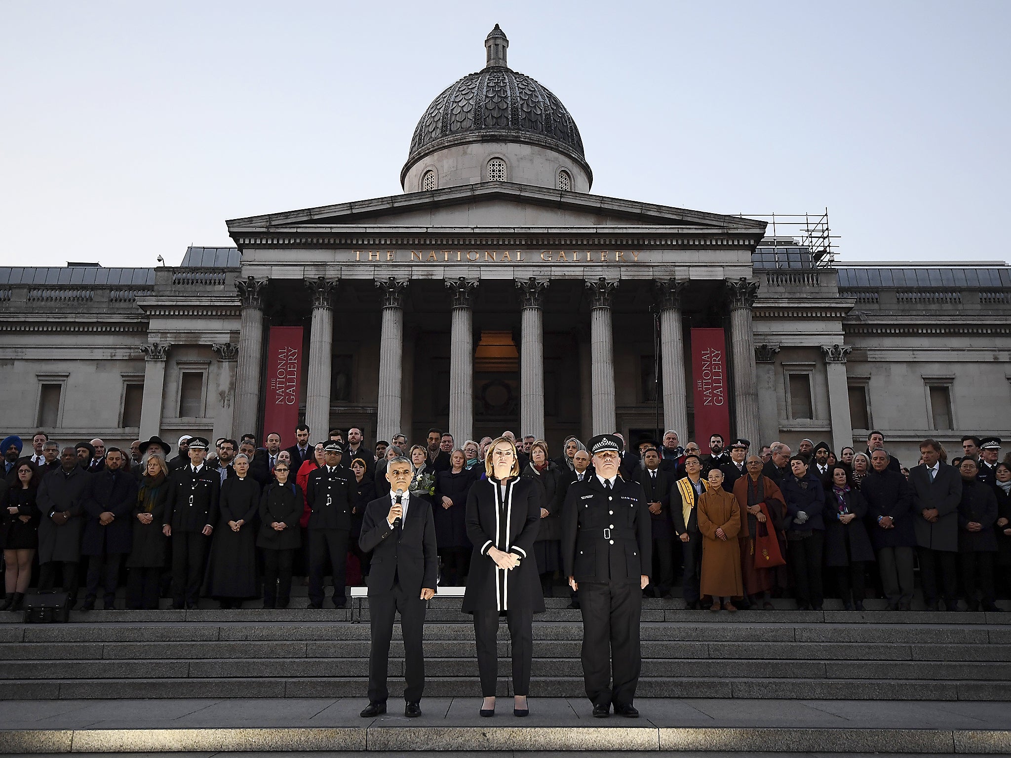 Sadiq Khan, Amber Rudd and Craig Mackey speak at a candlelit vigil in Trafalgar Square