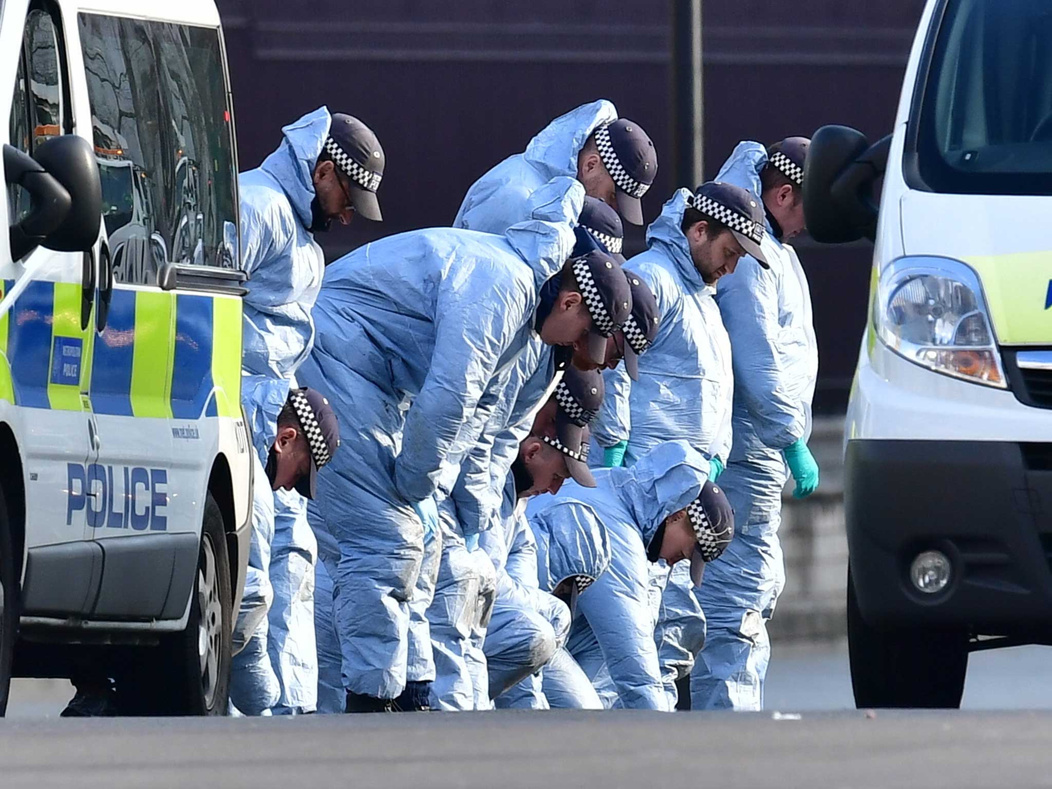 Police conduct a fingertip search near Parliament yesterday