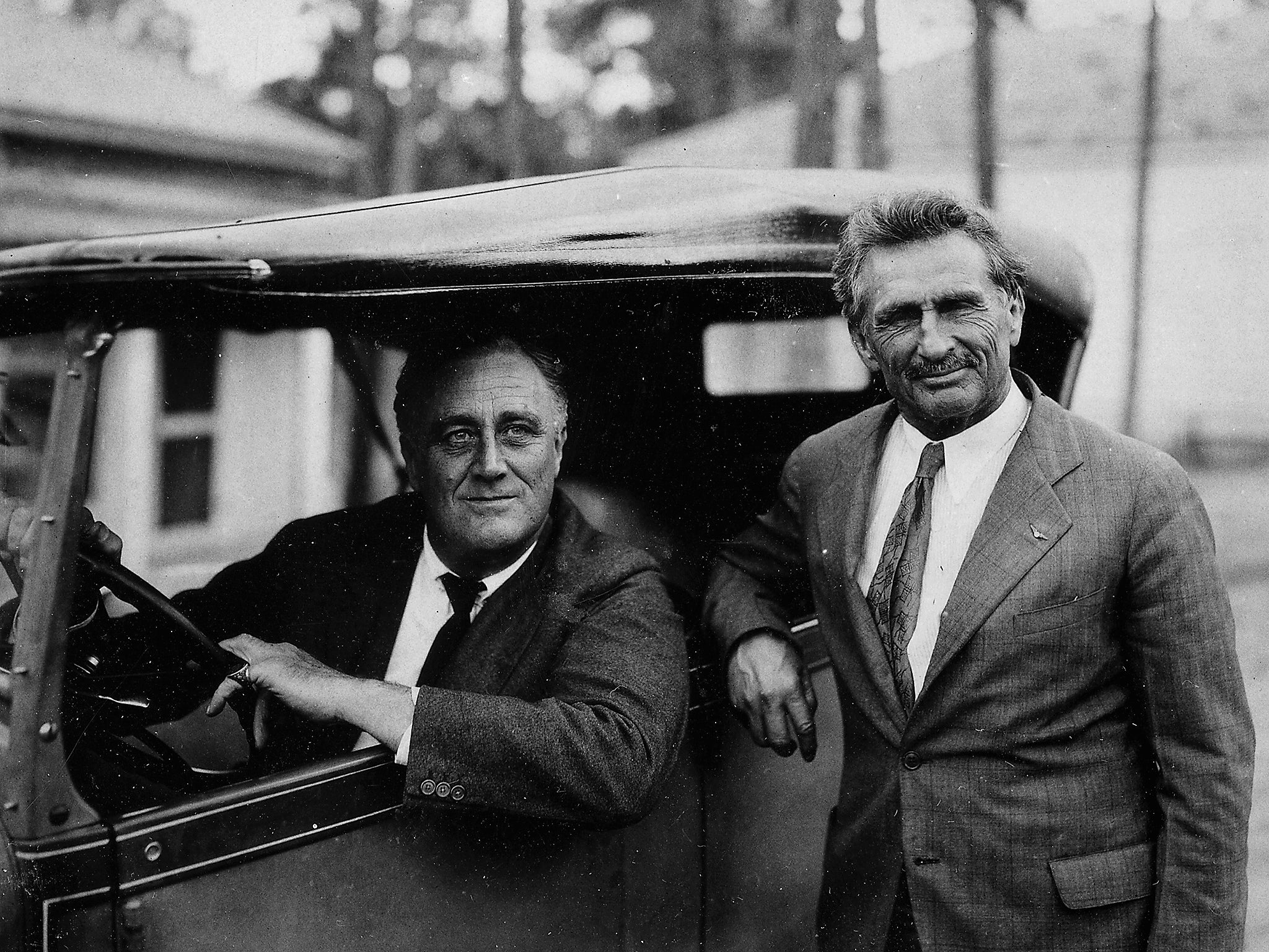 Bernarr Macfadden (right), pioneer of true-crime magazine publishing, meets US President Franklin D Roosevelt in Warm Springs, Georgia, 1931