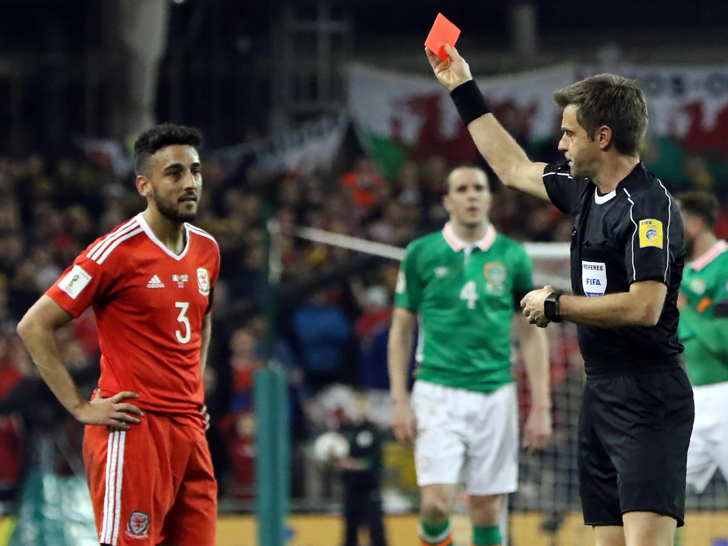 &#13;
Neil Taylor was shown a red card for the challenge on Coleman &#13;