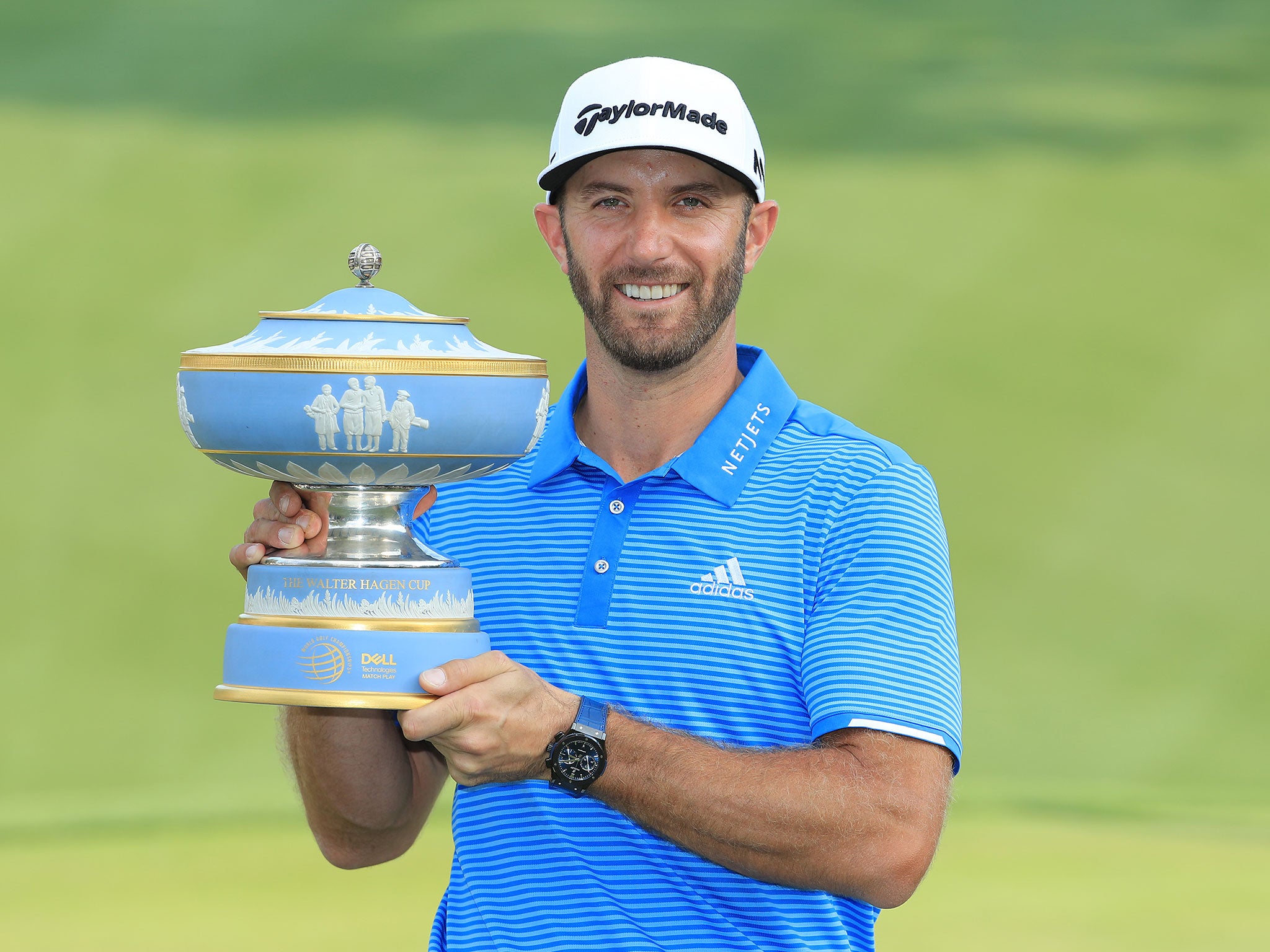 Dustin Johnson celebrates winning the World Match Play