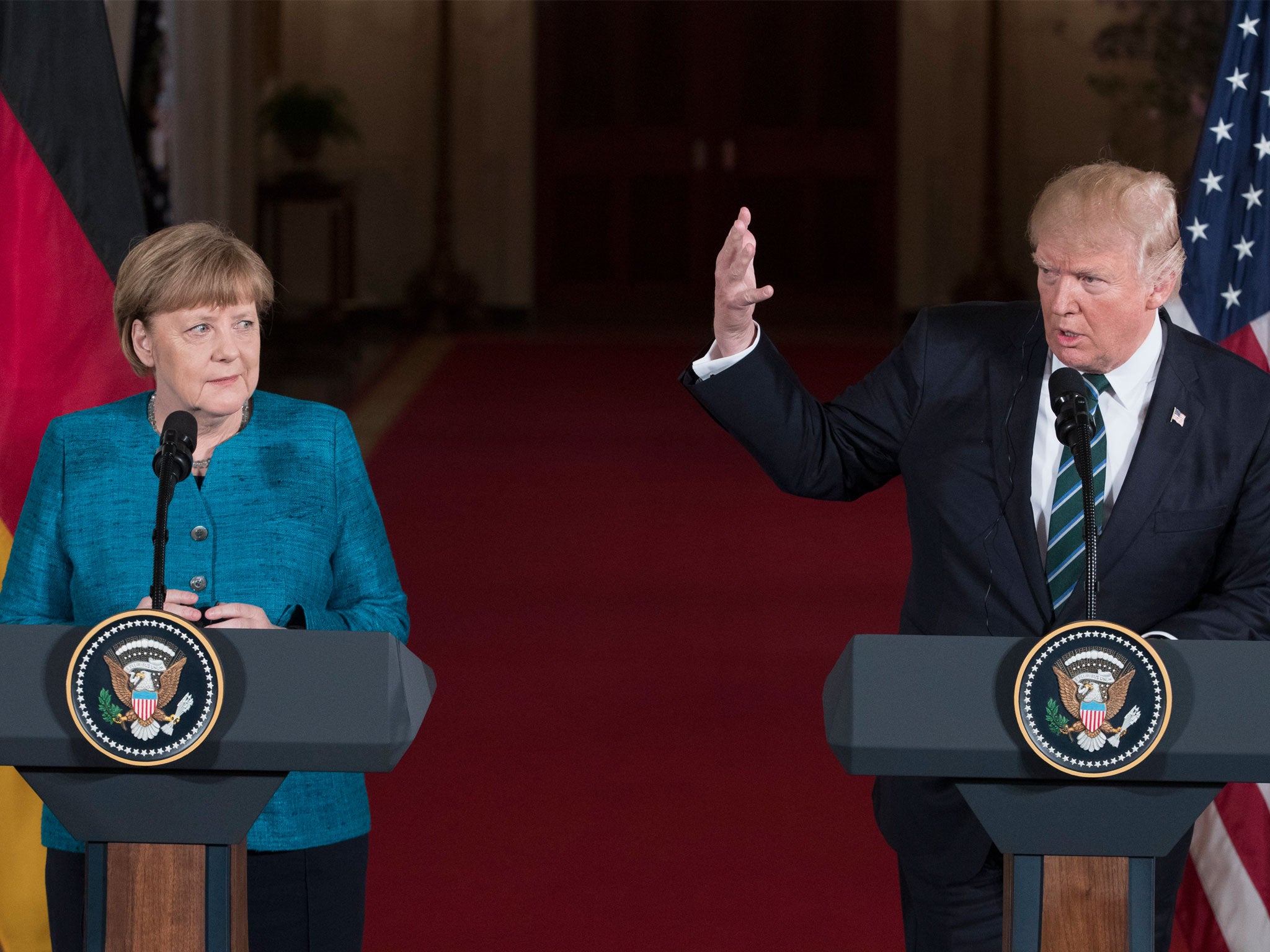 &#13;
Angela Merkel is seen as a more trustworthy leader than her US counterpart &#13;