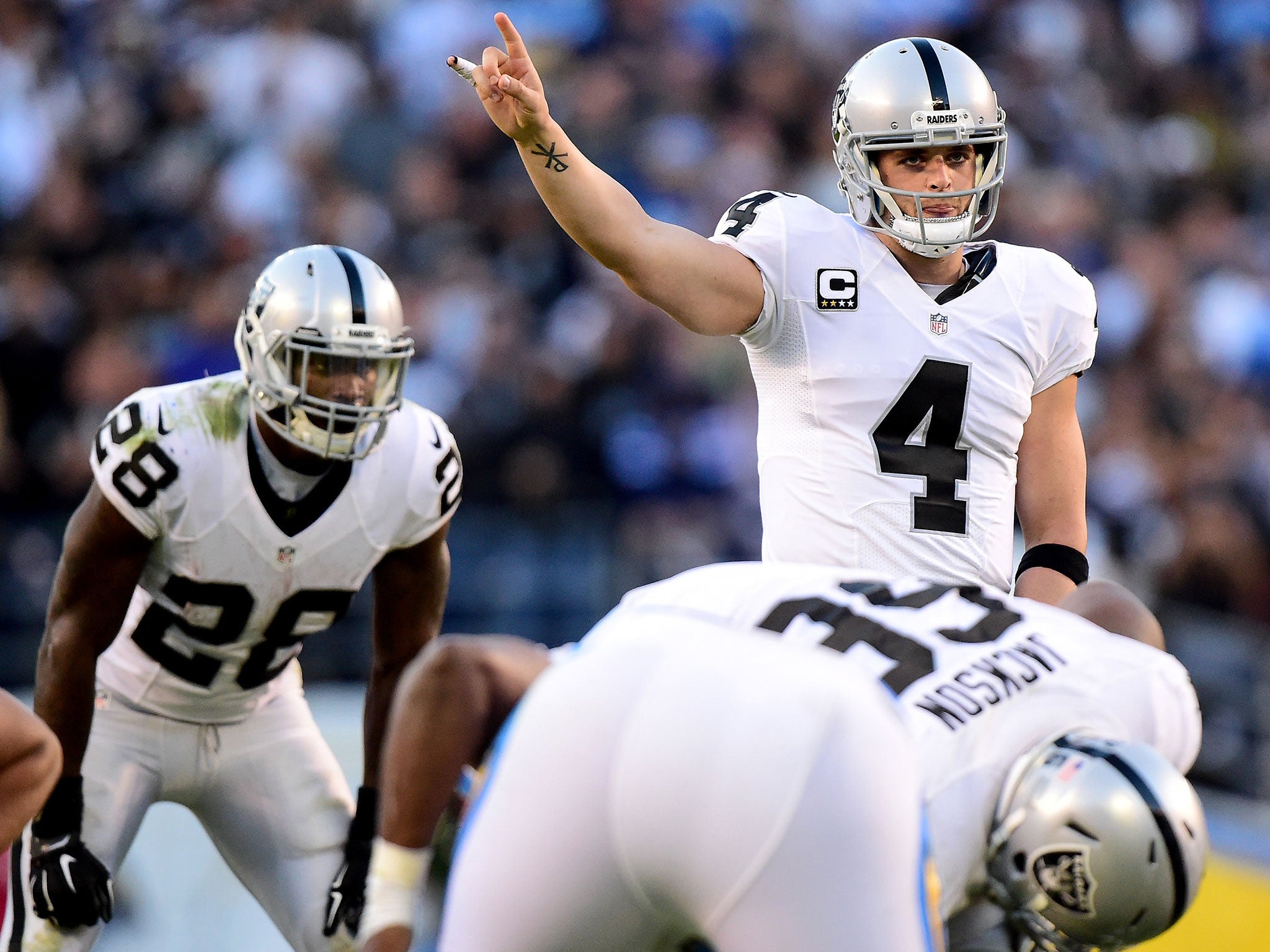 &#13;
Oakland Raiders quarterback Derek Carr in action &#13;