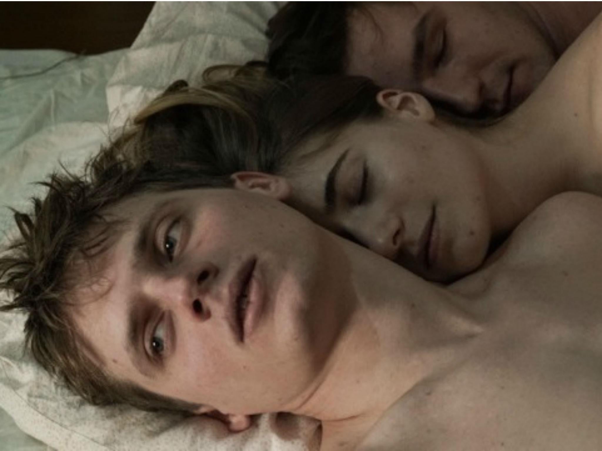 Krzysztof Baginski (front) and Michal Huszcza (back) in a scene with Eva Lebeuf in 'All These Sleepless Nights'