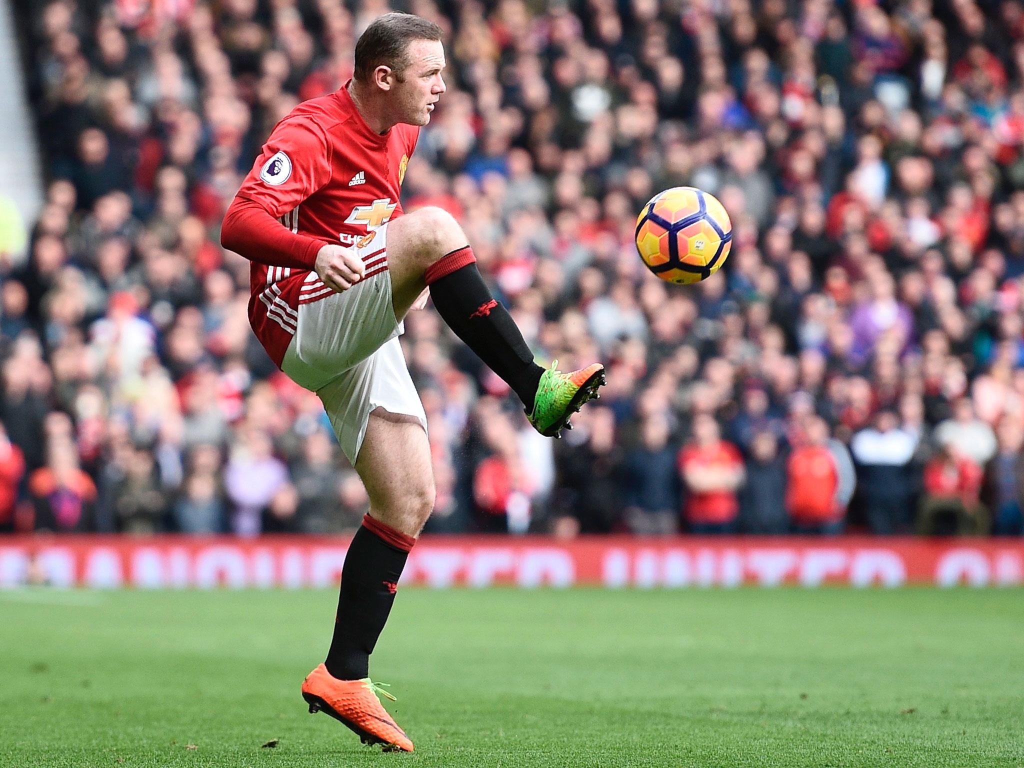 Evans felt Rooney would be central to Mourinho's plans