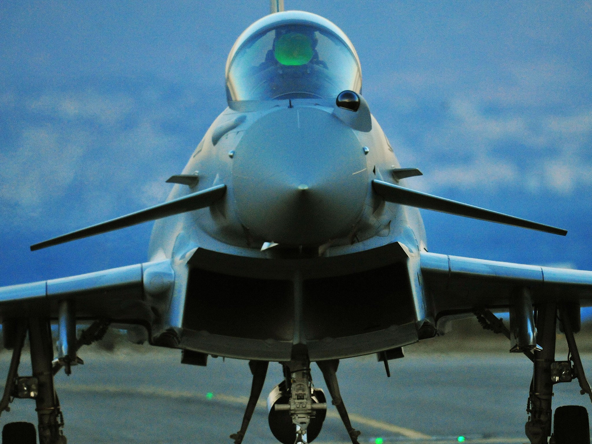 A RAF Typhoon jet arriving at RAF Akrotiri in Cyprus. Sir Michael Fallon says the deployment is part of the UK's commitment to protectings its Nato allies in Eastern Europe