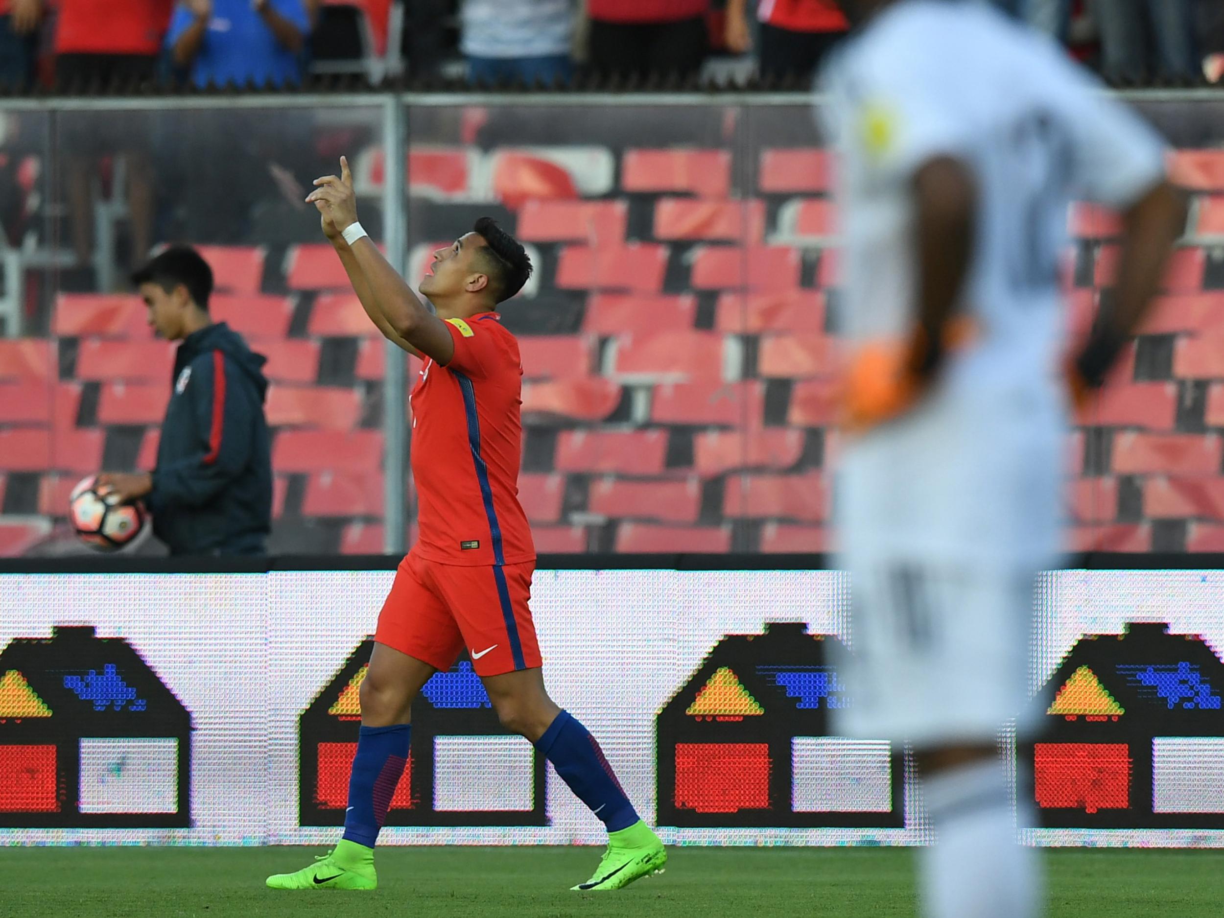 Sanchez celebrates his fifth minute goal against Venezuela