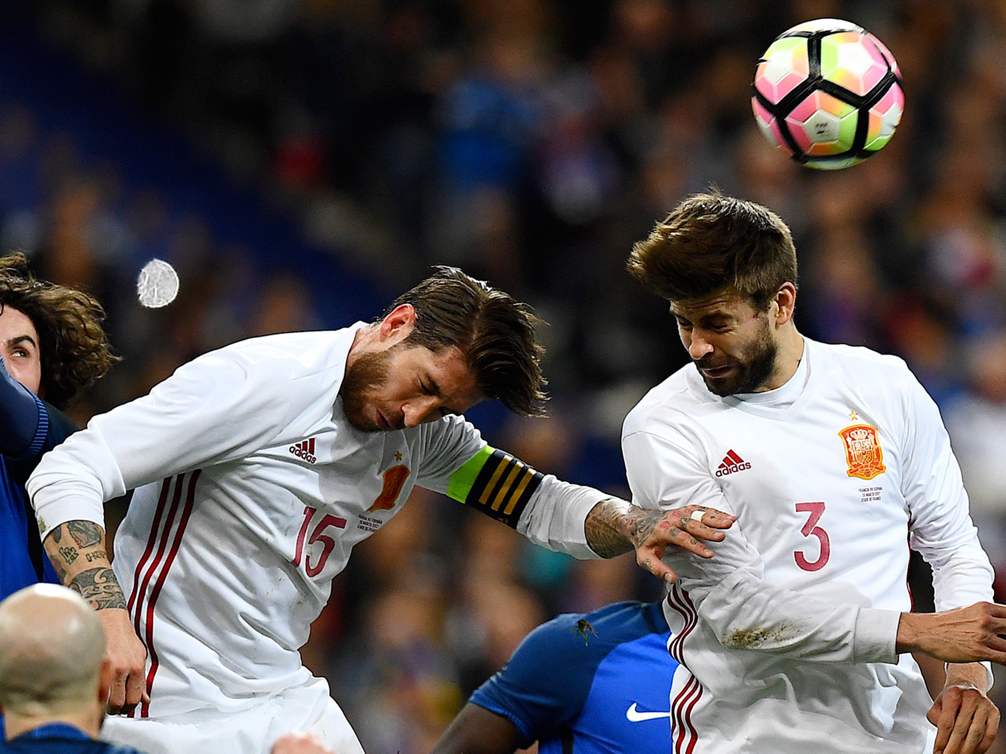 Sergio Ramos and Gerard Pique lined up alongside each other in white for Spain