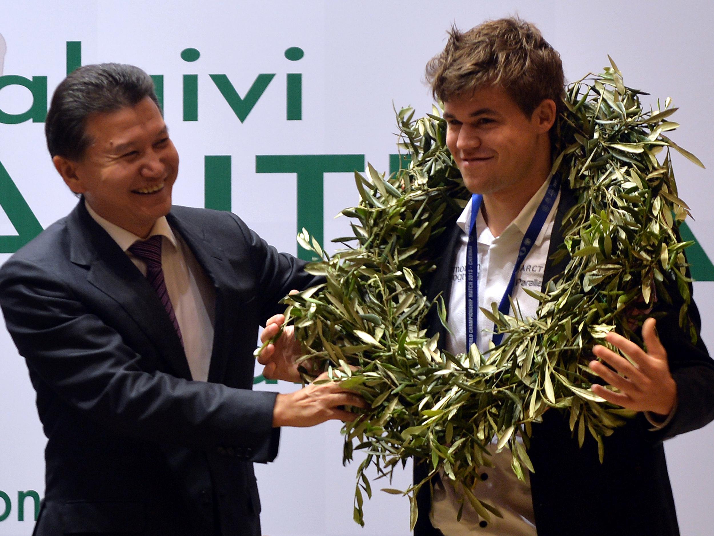 With Norwegian prodigy Magnus Carlsen in 2013