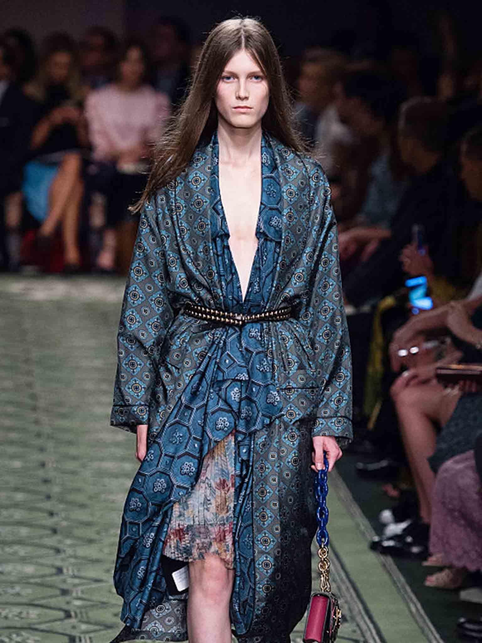 Burberry offered up silky numbers in paisley prints cinched at the waist with a studded belt