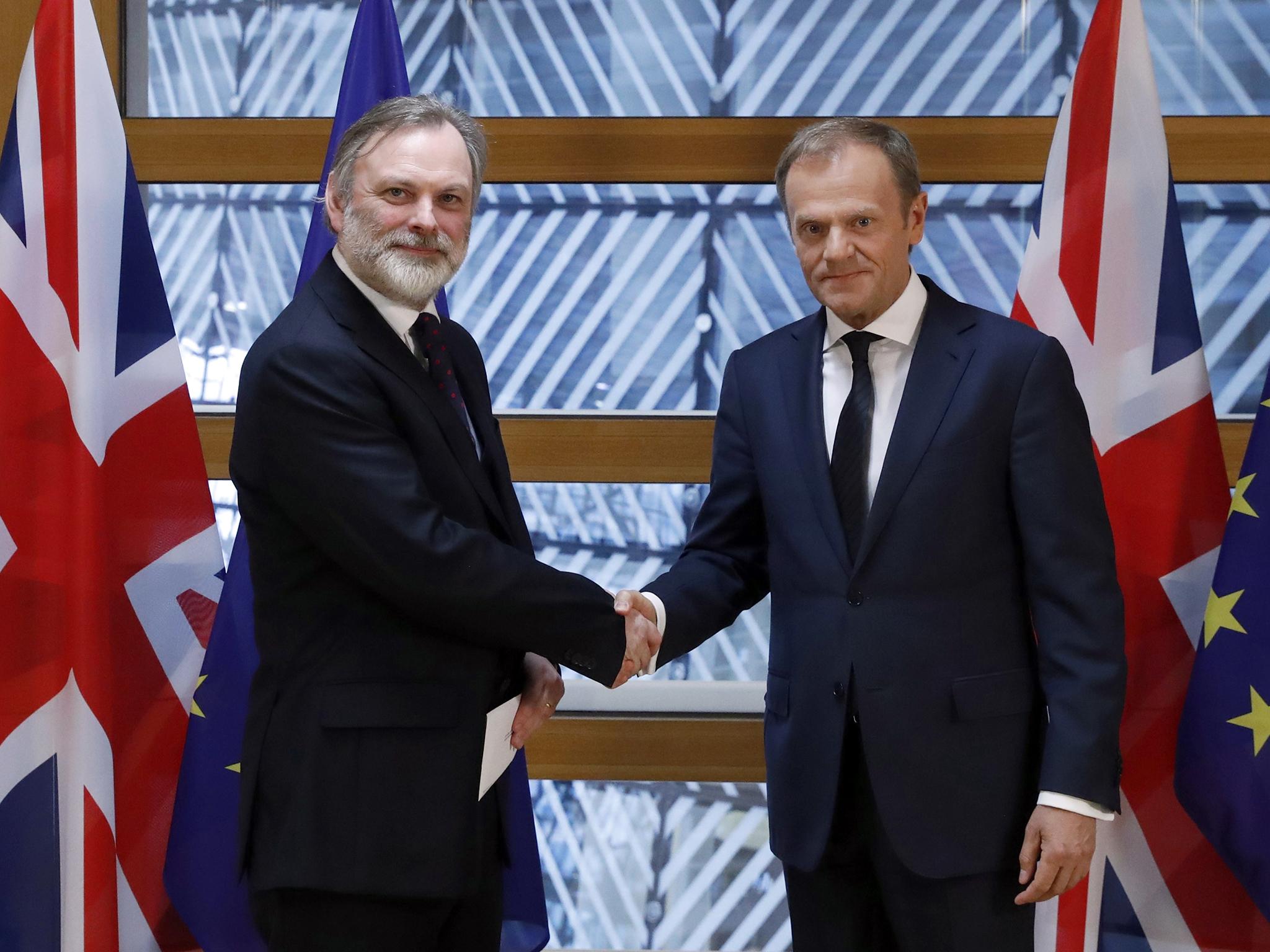 Britain's representative to the European Union Tim Barrow hand delivers Theresa May's Brexit letter in notice of the UK's intention to leave the bloc to EU Council President Donald Tusk