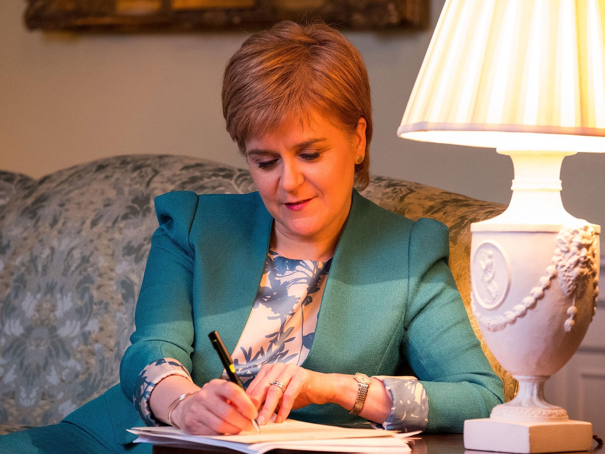 The Scottish Government tweeted a picture of the First Minister with her feet up on a couch in her Bute House residence writing the Section 30 letter