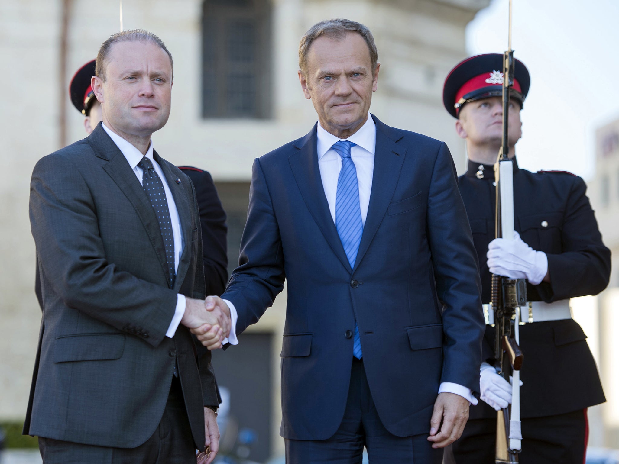 Joseph Muscat, left, currently holds the rotating presidency of the European Council