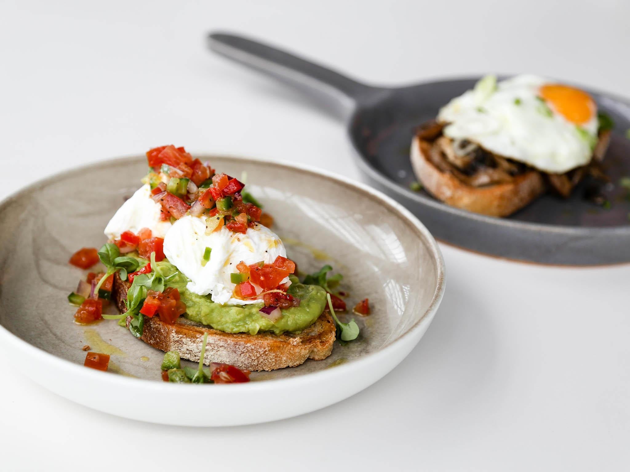 Avocado on toast, poached eggs, tomato and chilli salsa