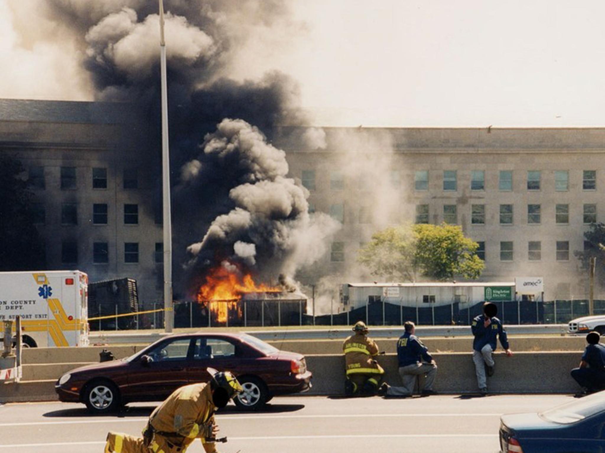 Some of the images show fire fighters battling to extinguish a huge fireball, while others show debris from the attack scattered across the area