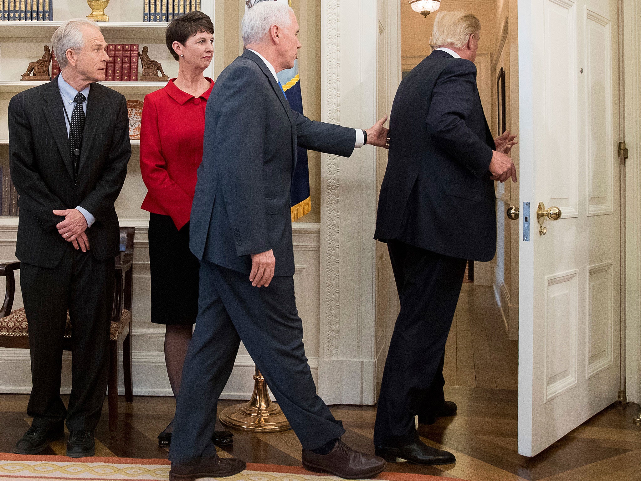 Donald Trump leaves without signing executive orders on trade during a ceremony at the Oval Office of the White House on 31 March