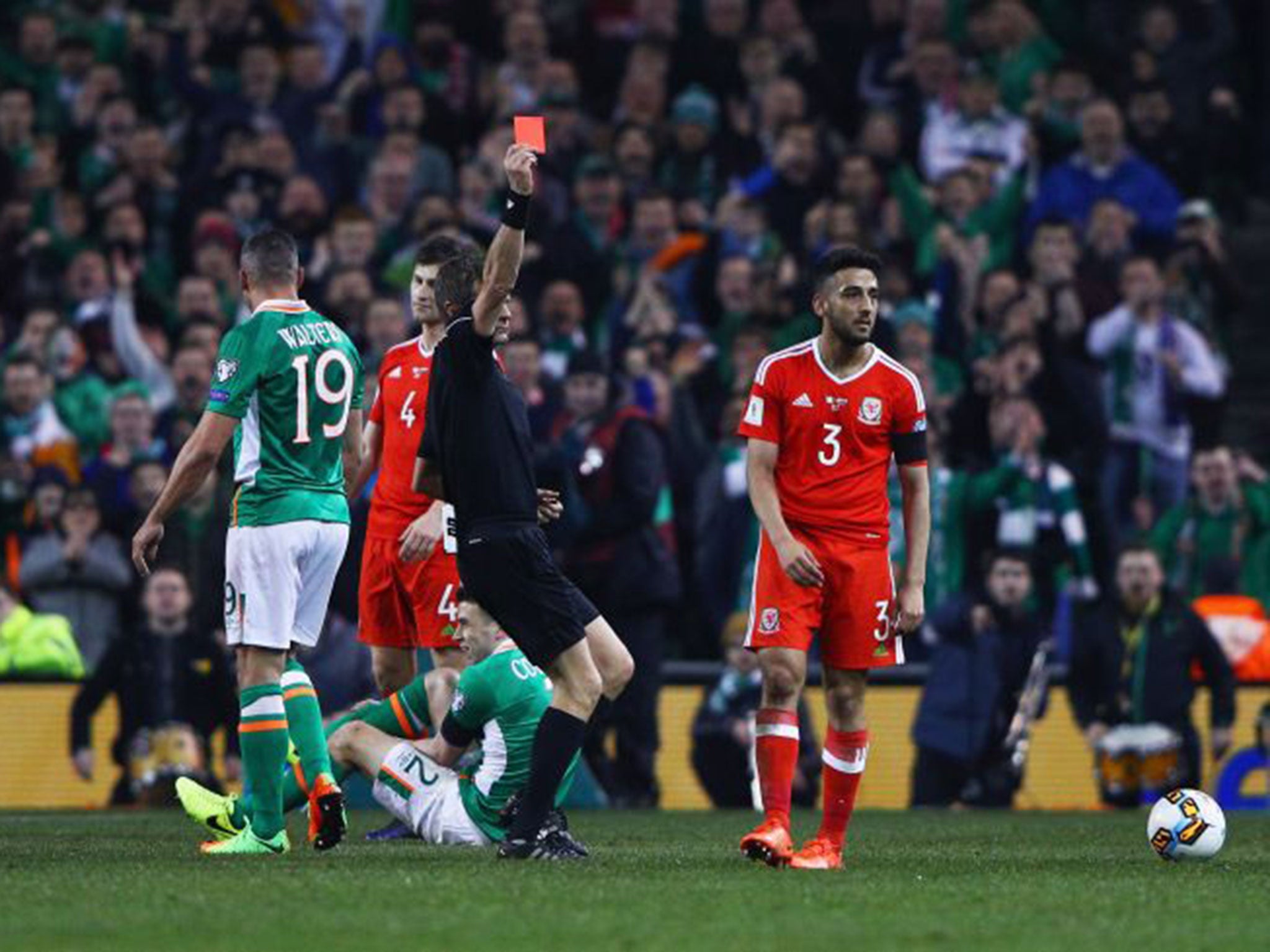 Neil Taylor has been defended by former Liverpool player Jamie Carragher