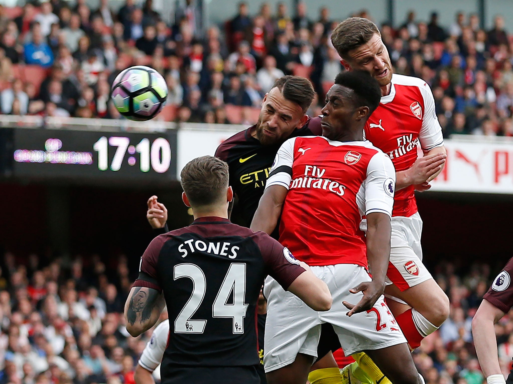 &#13;
Shkodran Mustafi heads home the equaliser for Arsenal &#13;