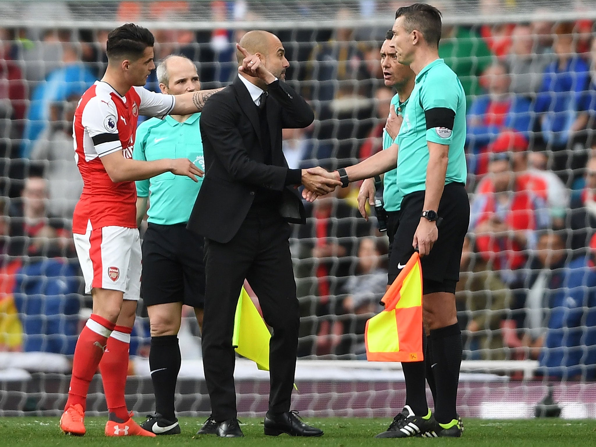 Guardiola lets his thoughts be known to the match officials after the final whistle