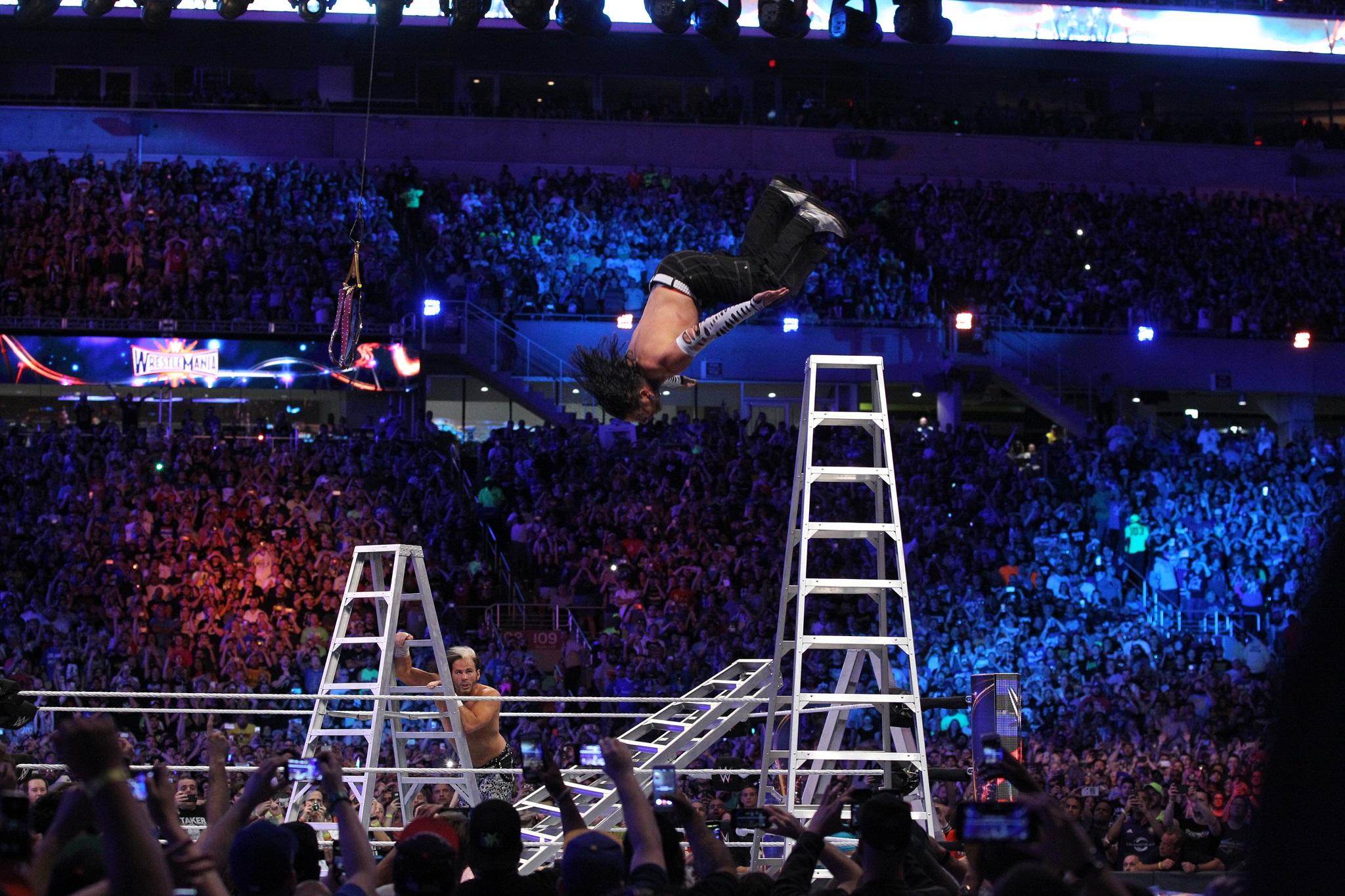 Jeff Hardy delivers a Swanton Bomb off the top of a ladder (WWE)