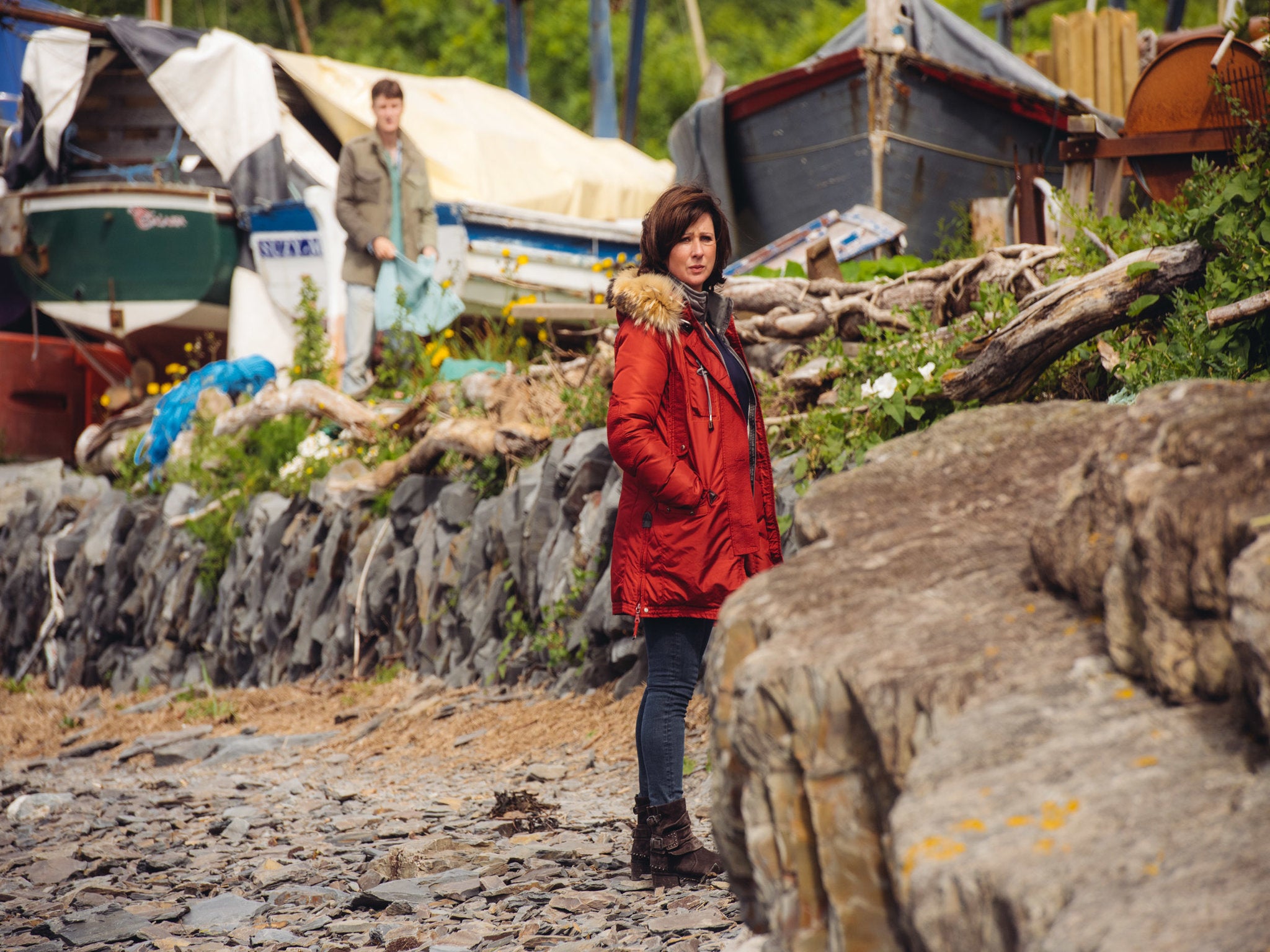 DI Mared Rhys, played by Mali Harries, in her trademark red parka (Fiction Factory)