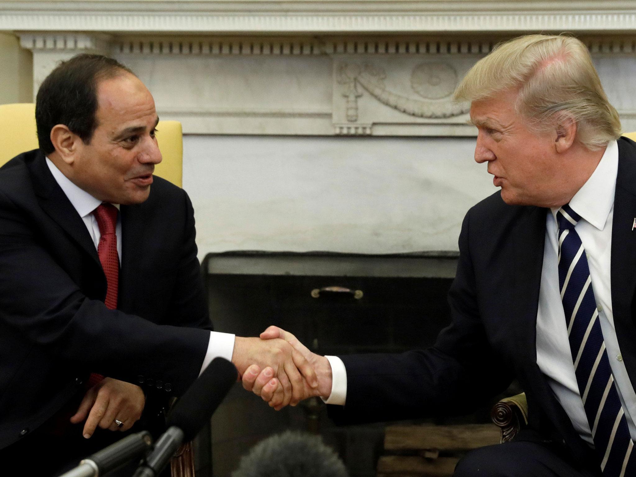 Mr Trump shakes hands with 'fantastic guy' Abdel Fattah al-Sisi at the White House last month