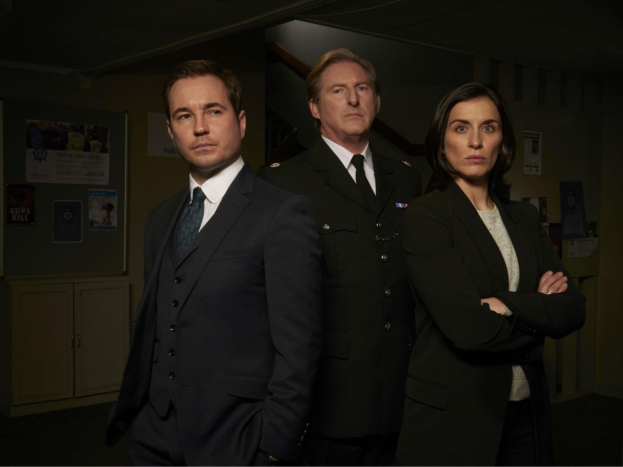 Arnott with AC-12 colleagues Superintendent Ted Hastings (Adrian Dunbar) and Detective Sergeant Kate Fleming (Vicky McClure)