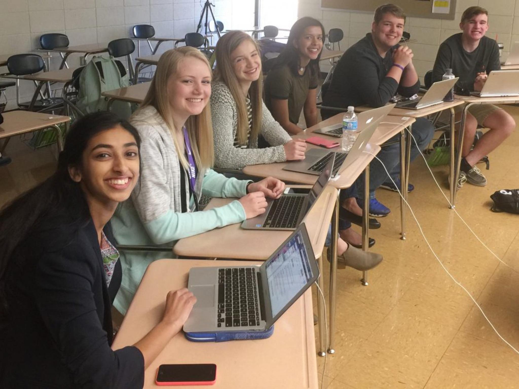 Gina Mathew, Kali Poenitske, Maddie Baden, Trina Paul, Connor Balthazor and Patrick Sullivan prepare to Skype with their then school principal, Amy Robertson, who was at the centre of their investigation